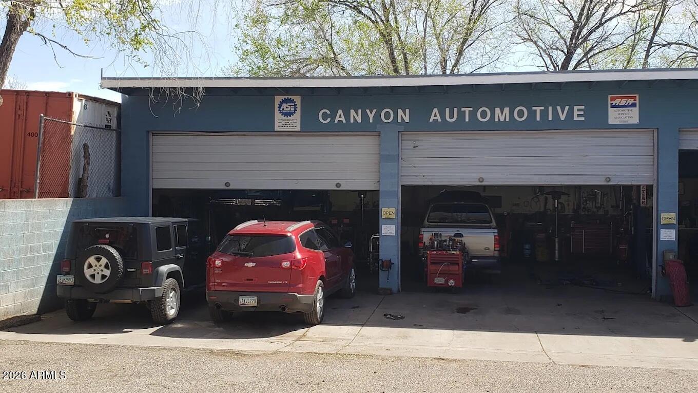 Almost 50 years as Sedona's long time auto repair garage! Home of Canyon Automotive(business not for sale). Current tenant paying $5K per month with about 2years left on lease. Also, an older little house on property(783 sq ft) in rough shape. Will need updating and remodeling. Almost a half acre with loads of parking. Currently 8 bays with 3 lifts plus office. CLA for more info and an appointment to view.