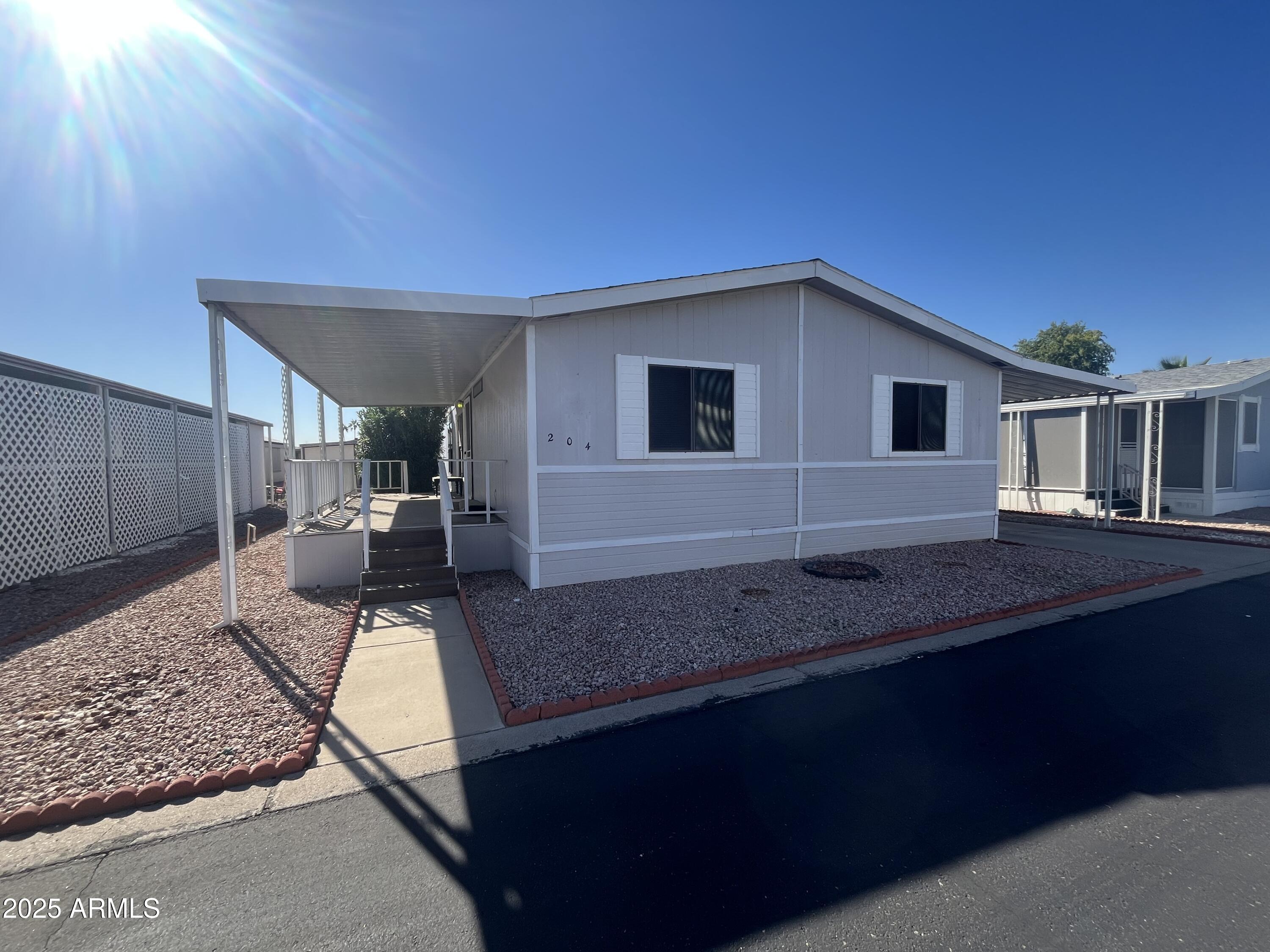 SPACIOUS WIDE OPEN FLOOR PLAN! This 2Bed/2Bath home has an extra Craft/Office space as well as a great PRICE! A large storage shed, a cozy porch to enjoy early morning sunsets! Sellers are motivated! Dont miss this great deal! Located in a highly sought after community of Rose Garden. A gated 55 plus age restricted resort style community. Community features heated pool, spa, sauna, pickleball, 2 dog parks, one even has agility equipment. Tons of activities.