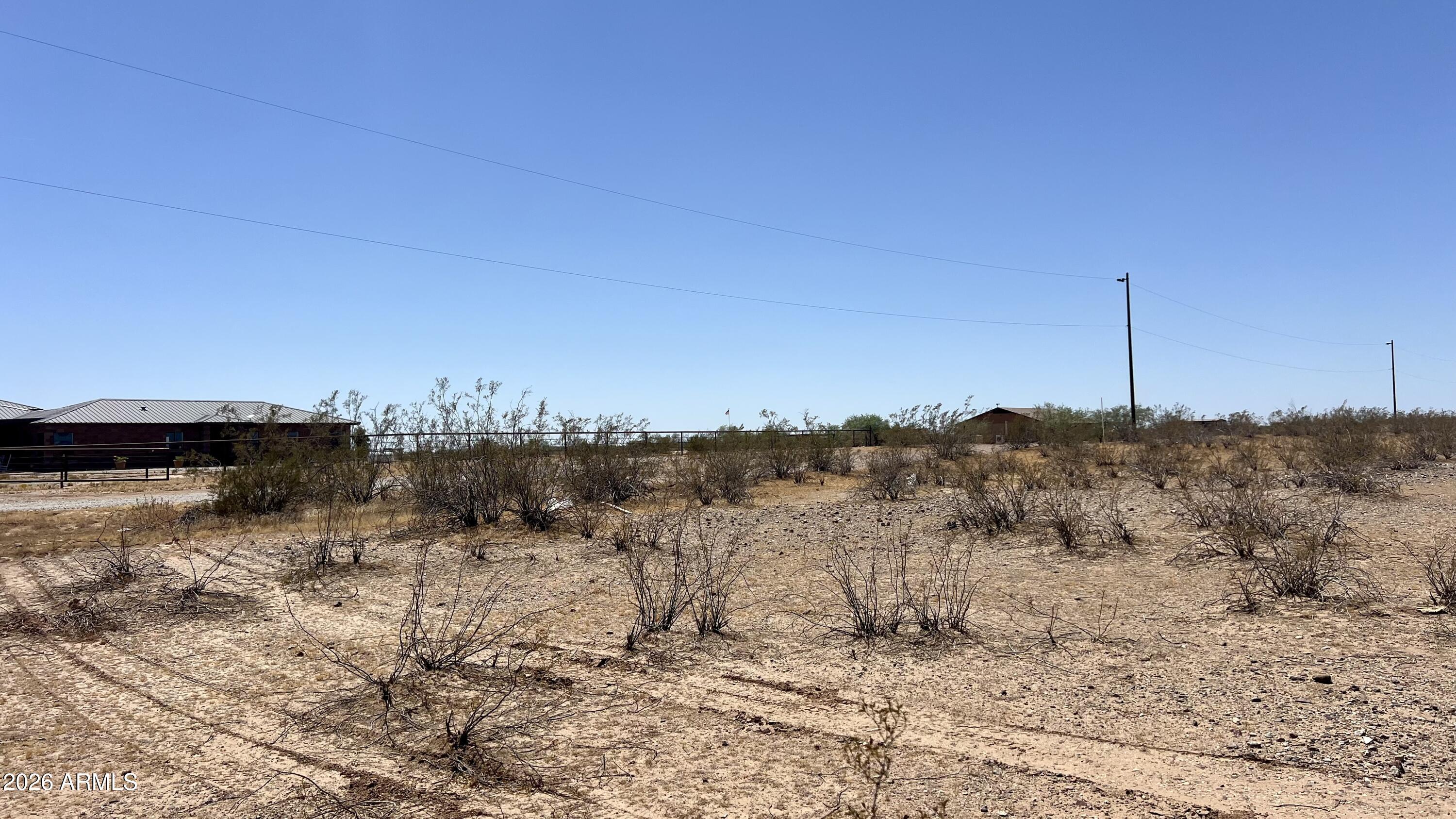 Great Acre+ flat buildable lot in Wittman.  Lot includes shared well.  Power is right on 235th Ave.  Lot is NOT located in flood.  Bring your vision, horses and toys.