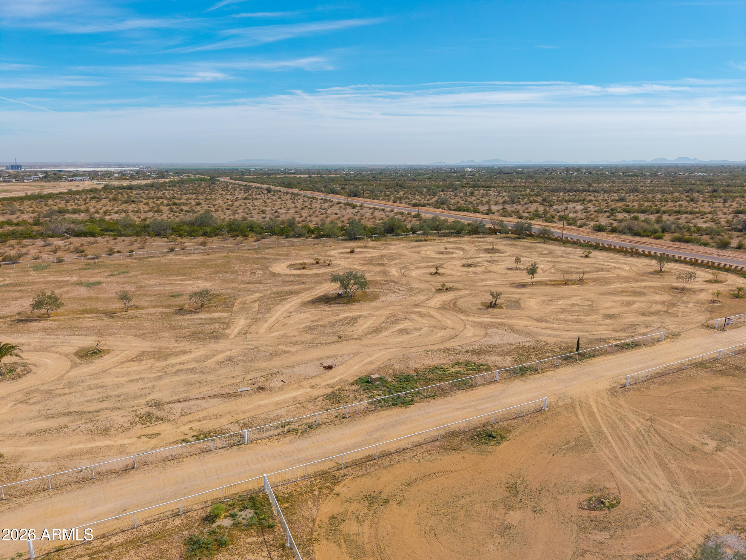 Rare find! This fully fenced, level 5-acre property sits just off paved roads and offers sweeping mountain views and endless potential! Whether you're a developer looking to subdivide or a buyer wanting a private retreat, this parcel checks all the boxes. Surrounded by beautiful custom homes with no HOA restrictions, and horses and RVs allowed, this is your chance to own wide-open space without sacrificing accessibility! A MUST SEE!