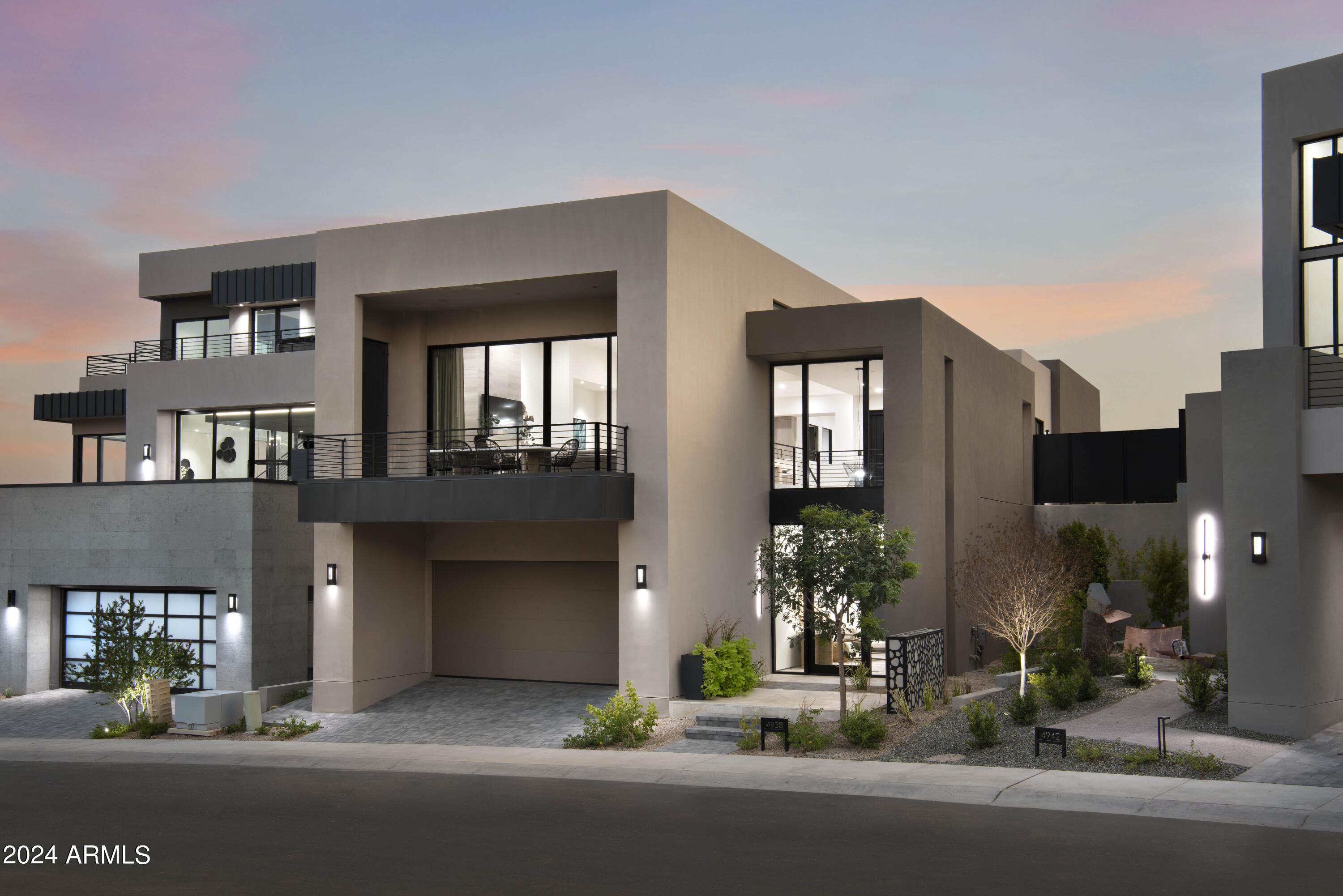 **Now accepting bitcoin for payment!*  FULLY FURNISHED AND TURN-KEY READY. A NEW PRIVATE RESIDENTIAL COMMUNITY WITH A COVETED LOCATION AT THE BASE OF CAMELBACK MOUNTAIN ADJACENT TO THE ICONIC PHOENICIAN® IN SCOTTSDALE. ONLY A SHORT DISTANCE TO FASHION SQUARE AND OLD TOWN SCOTTSDALE. THIS COLLECTION OF CUSTOM HOMES BUILT EXCLUSIVELY BY CULLUM HOMES  THAT REFLECT A TIMELESS, MODERN DESIGN AND LOOK OUT OVER THE BEAUTIFUL PHOENICIAN® GOLF COURSE.  FEATURING THE ''DESERT ZEN LIVING'', A TWO-STORY HOME FEATURING 2 BEDROOMS, 2.5 BATHROOMS, AND A 3-CAR GARAGE. THROUGH THE EXTRAVAGANT FRONT ENTRANCE LOCATED ON THE LOWER LEVEL, A BEAUTIFUL STAIRCASE OR AN ELEVATOR TAKE YOU TO BOTH LEVELS OF THE RESIDENCE. THE MAIN LEVEL BOASTS TWO EN-SUITE BEDROOMS, A FORMAL DINING AREA, OPEN CONCEPT KITCHEN, ADDITIONAL POWDER ROOM AND THE GREAT ROOM AREA. SPACIOUS KITCHEN WITH ISLAND, EAT-AT BAR AND WALK-IN PANTRY. A GLASS WALL LEADS YOU TO THE COVERED PATIO OFF THE GREAT ROOM WHERE GORGEOUS VIEWS AWAIT YOU. OWNER'S SUITE WITH WALK-IN CLOSET, DOUBLE SINK VANITY, SEPARATE TOILET ROOM, TUB AND WALK-IN SHOWER. ALONG WITH AN ADDITIONAL EN SUITE BEDROOM, LARGE LAUNDRY ROOM WITH EXTRA STORAGE AND A DECK AREA. THE COMMUNITY IS GUARD GATED FOR PRIVACY AND SECURITY. AT THE BASE OF CAMELBACK MOUNTAIN, YOUR PRIVATE POOL, FITNESS CENTER, AND SOCIAL SPACES OFFER AN INTIMATE GATHERING PLACE FOR WELLNESS, SOCIALIZING AND RELAXATION. RESIDENTS ARE OFFERED THE OPTION TO JOIN THE PHOENICIAN® AMENITY ACCESS PROGRAM  ACCESS AND DISCOUNTS TO THE NEW ATHLETIC CLUB, 38,000 SQUARE FOOT SPA, TENNIS FACILITY AND RESORT POOLS AT THE PHOENICIAN® RESORT.