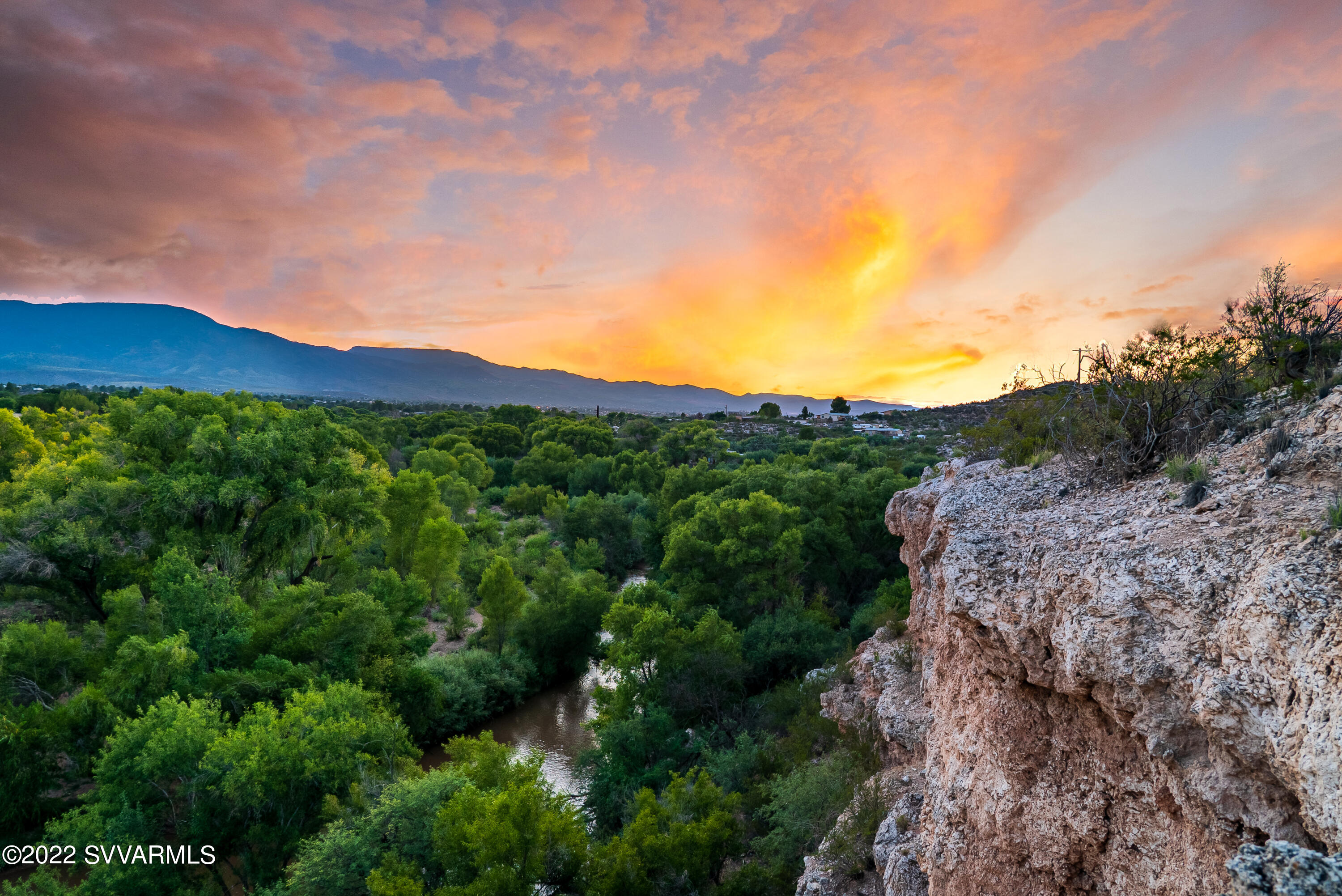 With stunning views of Mingus Mountain, overlooking the Verde River, the sunsets from this 4.77-acre lot are magical! Tani means Valley, and this Valley has the river flowing right through it! Private, yet still just about 10 minutes from town. The peaceful drive in takes you across Coconino Forest land and down into the the homesite which sits just above the Verde River and out of the flood plain. With only 7 total home sites in this location and one other home currently built, you'll have the feel of a much more rural, private property with out the long drive or lack of amenities.  Zoned for site built homes only with a min 1600SqFt.