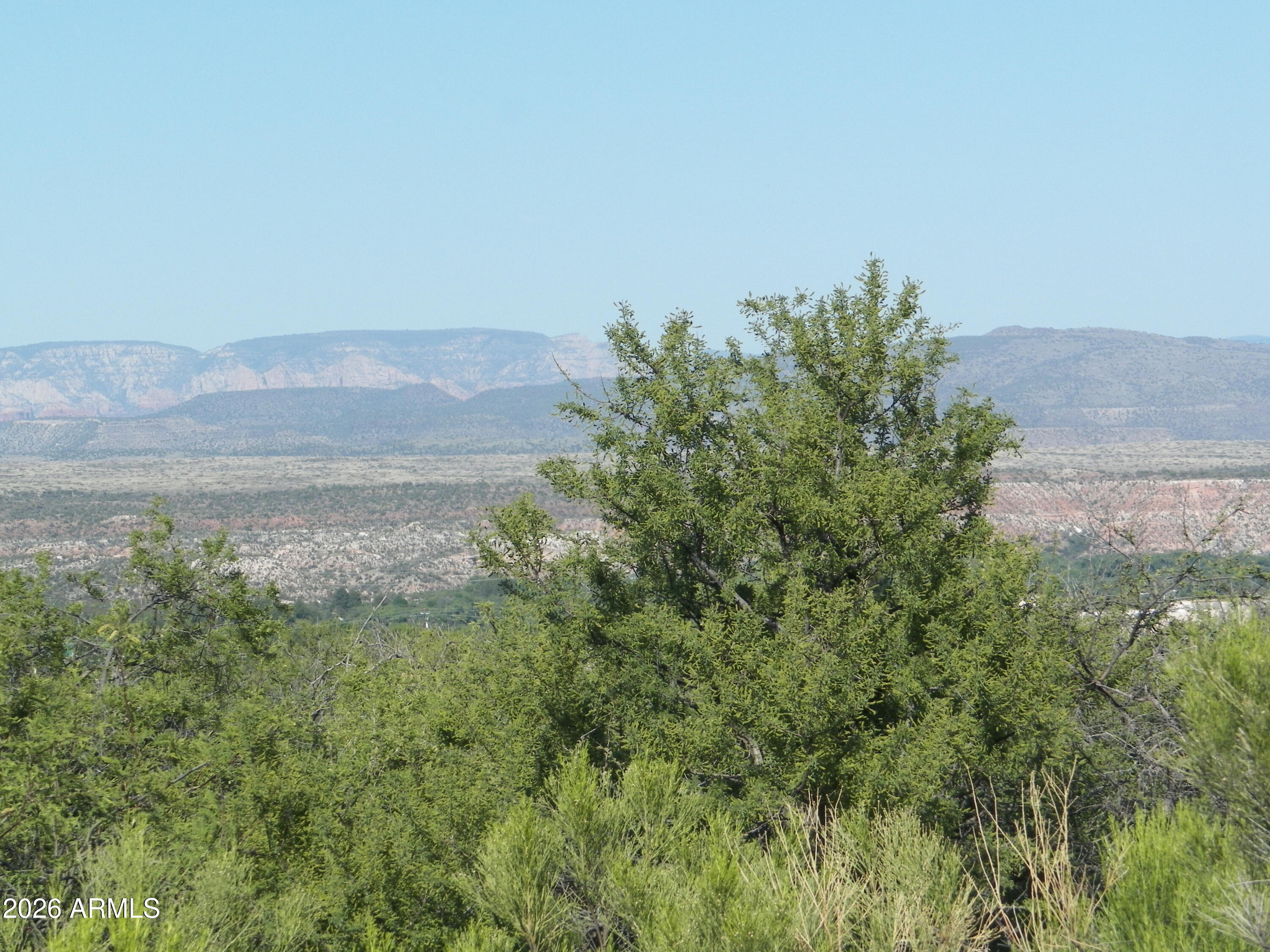 The Crossroads at Mingus is a Multi-Use Planned Area Community located in the historic Town of Clarkdale, AZ.  Nestled on the side of Mingus Mountain surrounded by majestic views, yet close to local amenities, Yavapai College hospital, recreation center, Shopping restaurants, Verde River, and several local parks, and so much more! Enjoy our 2 parks, Copper Penny Park has a pickleball court, children's playground, barbecue pits, and Skyline Park with 360-degree views of the Verde Valley!  Enjoy the subdivision trail!  From our location, you are approx. 5 to 28 minutes to the 7 towns located in this beautiful river basin valley.   This nice central location is hard to beat! Here at the Crossroads at Mingus, you can use our builder of choice (Jamison Builders) or choose your own builder.