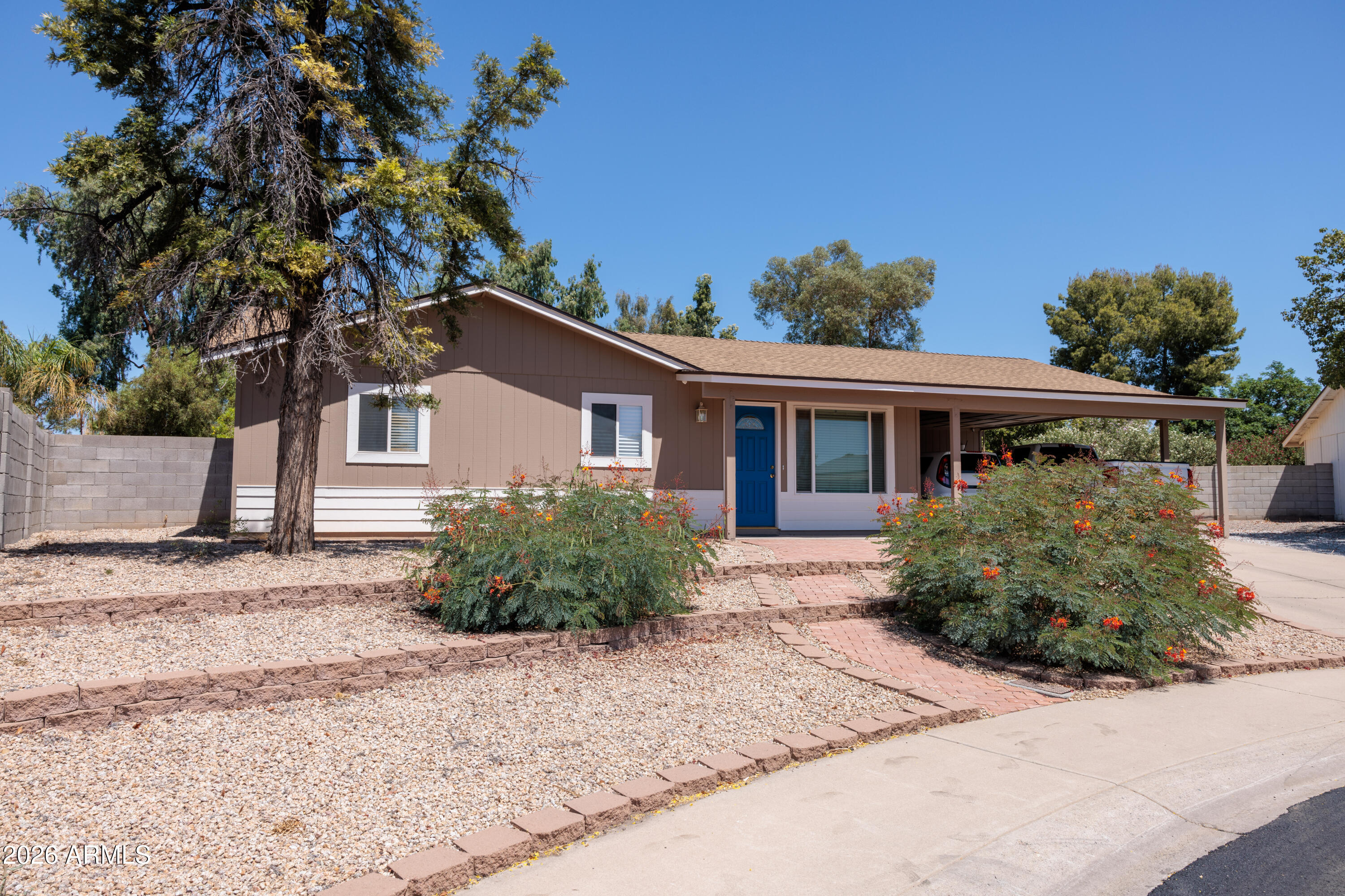 Beautifully updated and well cared for home in the heart of north phoenix tucked away in quiet cul-de-sac.  Full kitchen remodel, new roof, remodeled bathrooms and full interior and exterior paint all done within the last two years! Additional highlights include a 1000sq ft air conditioned detached garage/workshop on this spacious quarter acre lot. This home is ready to move in!