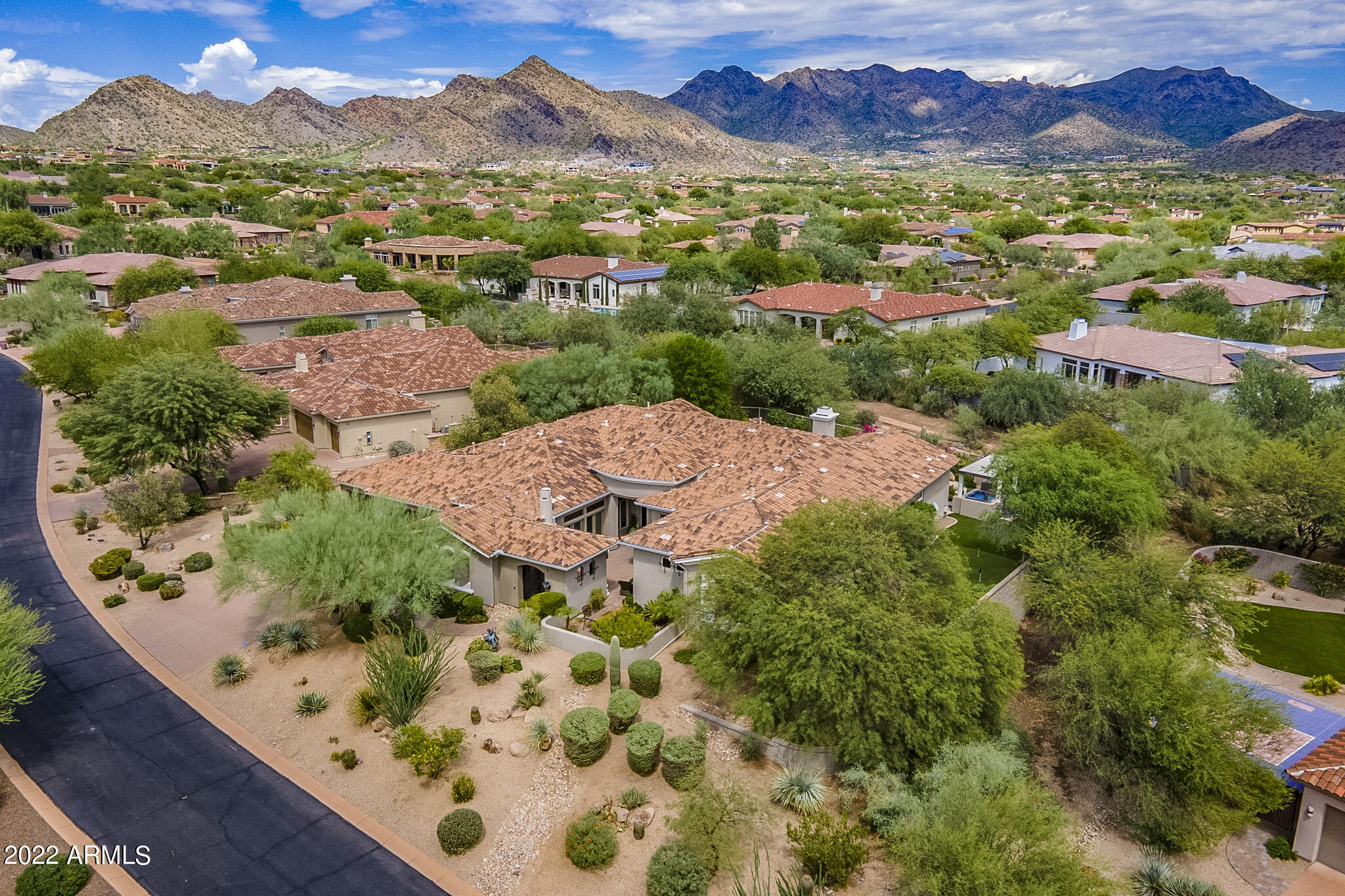 Luxury Living with Unmatched Views.  
Discover refined living in the highly sought-after gated community of La Strada—one of Scottsdale's best-kept secrets, adjacent to DC Ranch. Perfectly situated next to Market Street and just minutes from North Scottsdale's premier dining, golf, hiking, and biking trails, this home offers both convenience and exclusivity.
The residence has been thoughtfully updated, most recently; a complete remodel of the primary bathroom. A chef's dream kitchen features brand-new Wolf appliances and a spacious, functional layout ideal for both seasoned cooks and casual entertainers.
 Every bedroom is an ensuite. Plus, a private attached casita with bathroom perfect for an office or guests. The home's remarkable design showcases soaring cathedral ceilings, glass pocket doors, and a wall of French doors that create seamless indoor-outdoor living. Step outside to your lush backyard retreat, where resort-style landscaping sets the stage for effortless entertaining and relaxation all framed by breathtaking views of the McDowell Mountains.