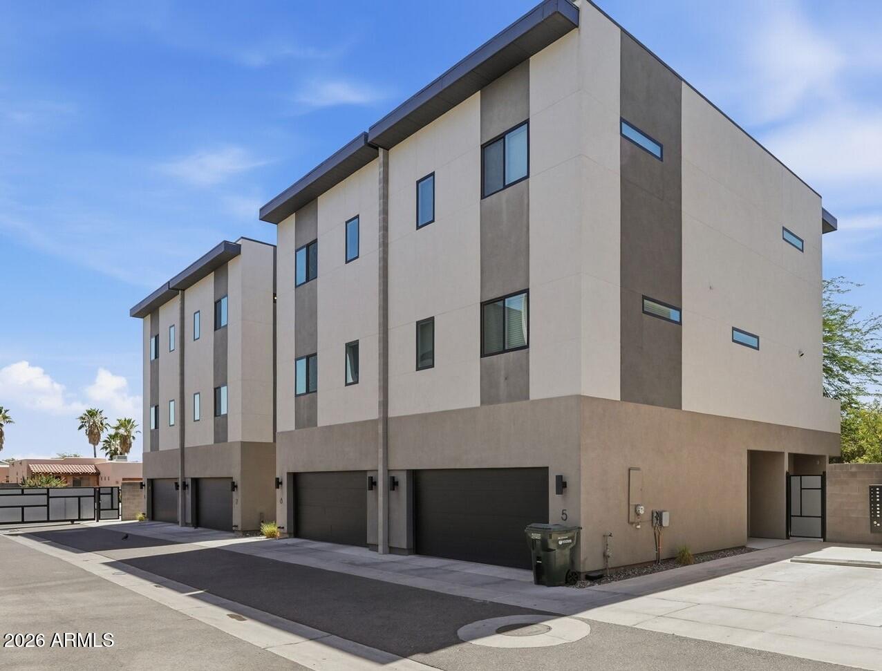 Contemporary townhome in the heart of Phoenix features 3 Bedroom plus den, 2.5 baths. Open floor plan with generous kitchen, dining and living room areas. Quartz counters in kitchen and baths, Frigidaire Gallery appliances, 9 ft. ceilings, contemporary Wood-Look Tile Flooring, LED lighting, tiled master bath shower, walk-in pantry, extra storage. Anderson windows and sliding doors, high efficiency Trane A/C, Over-sized 2-Car garage. Private covered patio and walk-out deck. 2-Car Garage. Exposed CMU block for a contemporary look! Pre-plumbed for water softener. Fantastic covered patio and private backyard. You'll be impressed with the design and style, and amazed at the construction quality!
