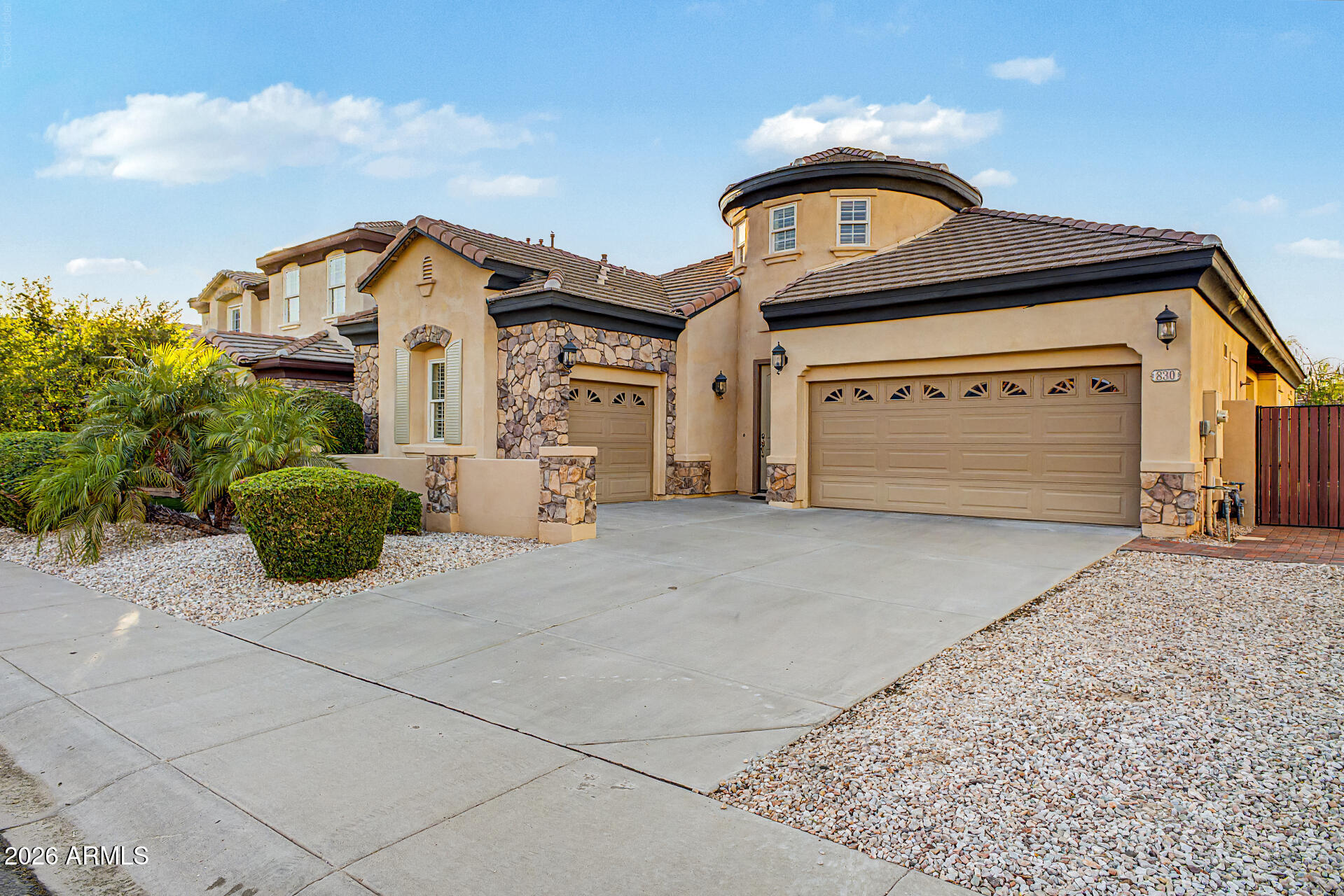 Beautifully updated 3 bedroom, 2.5 bath home with a huge loft and downstairs primary suite in the highly desirable McQueen Lakes community. This spacious floor plan offers two living areas, formal dining, vaulted ceilings, and a 3-car garage. The remodeled kitchen features new quartz countertops, custom cabinetry, stainless steel appliances, gas range, and island. Additional updates include new flooring in much of the home and a new A/C (2025). The split primary suite offers dual vanities, soaking tub, separate shower and walk-in closet. Upstairs loft is ideal for an office, media room or gym. Enjoy a covered patio with pavers and low-maintenance artificial turf.
