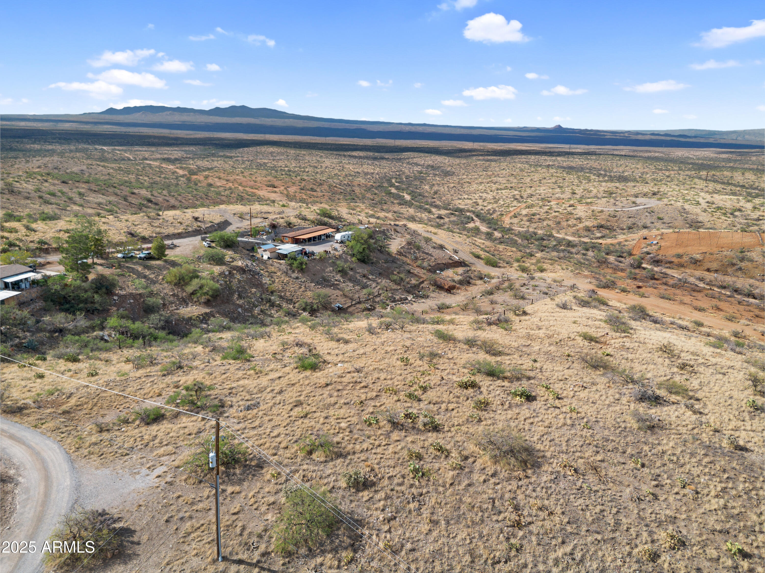 Beautiful 1.25 Rockliffe Build to Suit in this peaceful desert escape.
Located off Rockcliffe Blvd and Fort wayne Drive,This Pinal Co. property is zoned General Rural (GR) permitting a blend of residential and agricultural uses. This 1.25 acre parcel property offers the perfect blend of privacy, natural beauth and views, flexibility, and opportunity for both living and low-impact farming or animal husbandry. 
General Rural zoned property allows residential development (site-built homes, manufactured homes), agricultural pursuits, and the keeping of large animals such as horses, cattle, goats, and sheep.
Enjoy breathtaking desert and mountain views while creating your dream home, weekend retreat, or investment property. #LandForSale, #InvestmentRealEstate, MoralesGroupAZ,