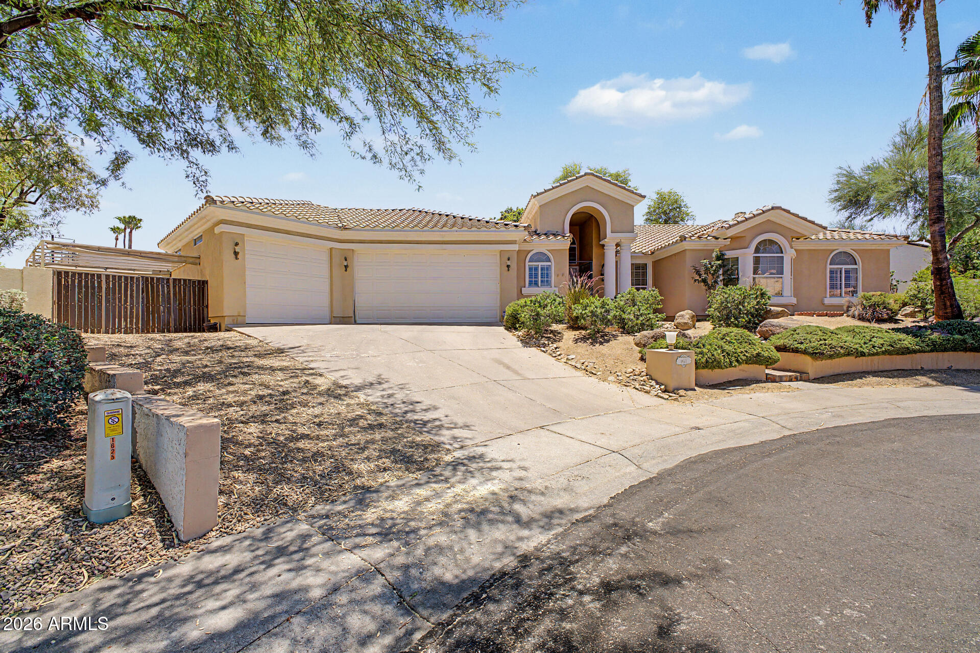Stunning North Phoenix home offering 4 bedrooms, 2.5 bathrooms, and nearly 3,000 sq ft of living space! Situated on a quiet cul-de-sac lot with beautiful mountain views, this single-level residence features an open and functional floor plan, neutral tile flooring, plantation shutters, architectural niches, and abundant natural light throughout. The upgraded kitchen boasts modern cabinetry, ample counter space, and overlooks the main living areas, making it perfect for entertaining. Spacious primary suite with generous bathroom and closet space. Enjoy Arizona living in the private backyard with a covered patio, mature landscaping, and breathtaking mountain views. Located within the highly desirable Paradise Valley Unified School District and close to shopping, dining, hiking trails, and freeway access. A rare opportunity to own a well-maintained home in one of North Phoenix's most sought-after locations!