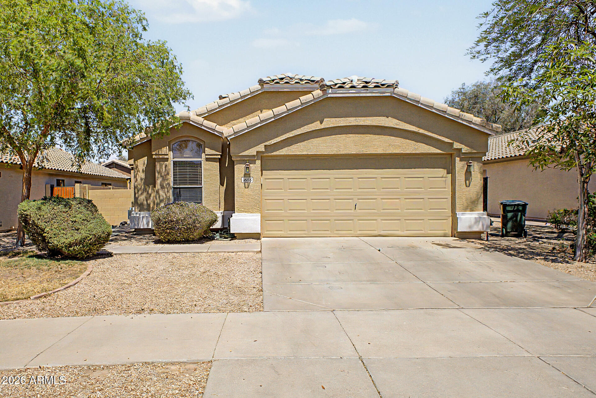 Welcome to your new home in Canyon Trails! This adorable home offers 3 bedrooms, 2 bathrooms, and a 2-car garage. Explore the bright and open interior, featuring vaulted ceilings, NEW CARPET & NEW PLANK FLOORING and interior paint. The kitchen features a breakfast bar with generous counter space, perfect for everyday living or entertaining. Get a good night's rest in the main retreat, including a private bathroom with double sinks and a separate shower & tub. Step outside to enjoy your extended covered patio- ideal for relaxing or hosting guests. Perfect home for a first-time homebuyer, vacation home or investment property!