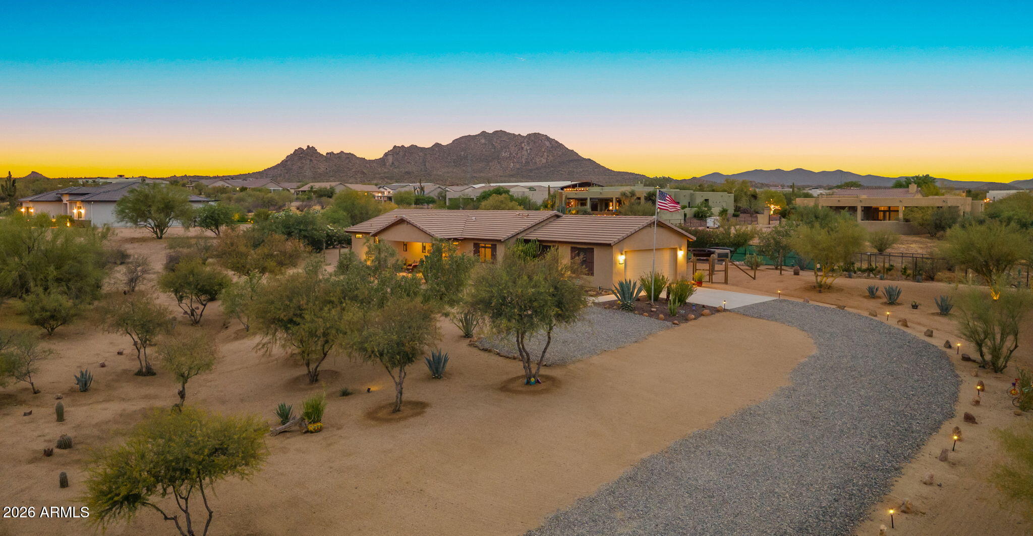 Highly improved one-acre lot offering remarkable views of Four Peaks, Toms Thumb and Granite Mountain. Privacy paired with proximity and vantage point. Elevated! The house is intelligently designed with split floor plan, North/South exposure, vaulted ceiling in open kitchen & main living area. 4-stool island, nearly wall to wall French sliding glass doors open to your back yard retreat. Large, covered brick paver patio just steps away from the hot tub!  Elaborate landscaping full of Arizona's finest indigenous plant life. Away from the hustle & bustle of the valley yet close to all that North Scottsdale has to offer. Strong producing well shared with four neighbors.  Well maintained, pun intended. Lot offers great horse property options, ability to add a casita, pool or whatever you desire.  Come see for yourself.