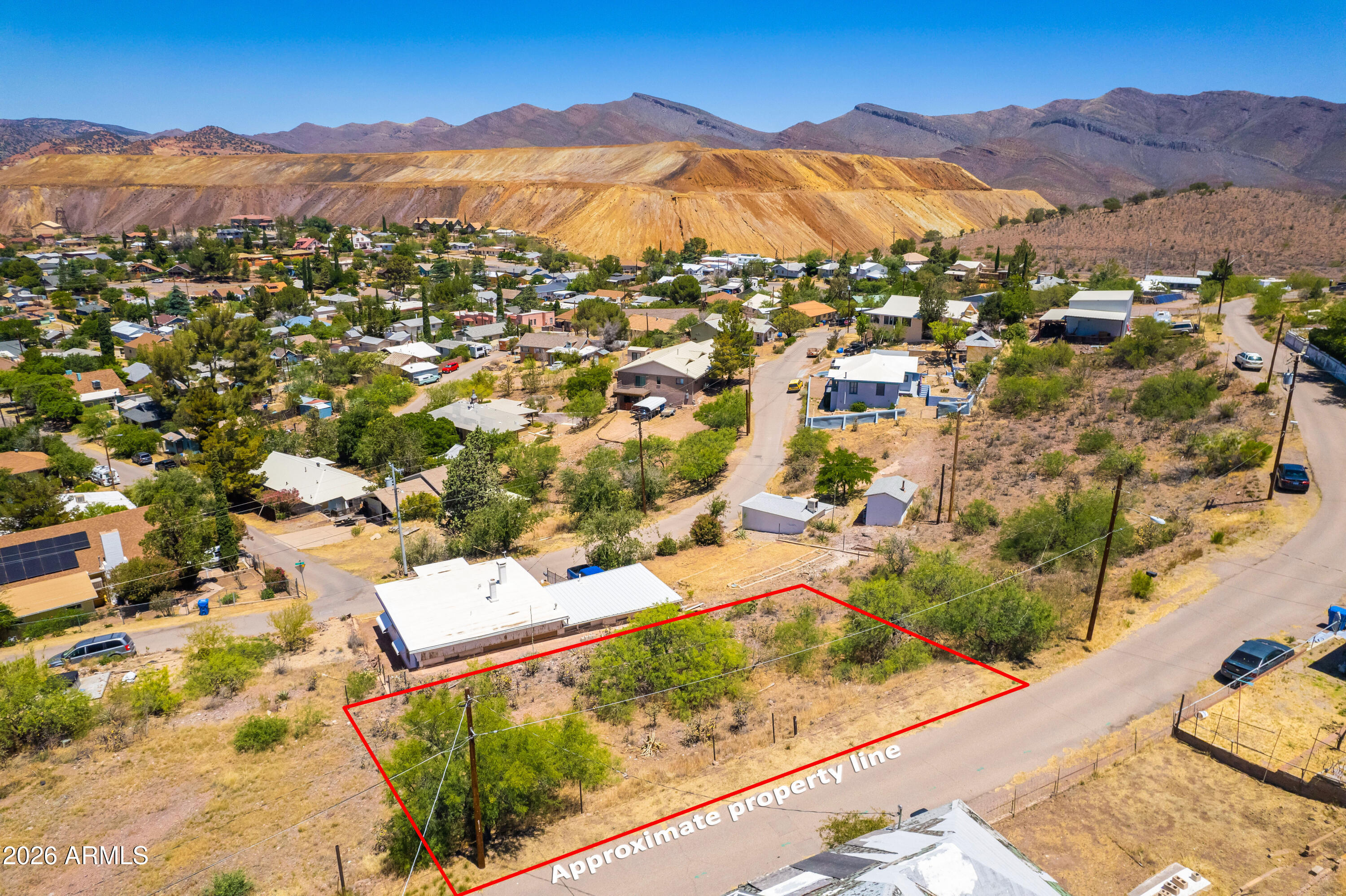 Buildable lot in historic Warren district, Bisbee AZ. 5,663 sq ft 
(0.13 acres) on Mojave Trail. City water, sewer, and electric 
available at the street. No HOA. No well or septic required.

Warren is Bisbee's neighborhood -- paved roads, 
mountain views, walkable to Warren Ballpark and Old Bisbee's arts 
and dining scene. Mile-high elevation, four seasons, 300 days of 
sunshine.
