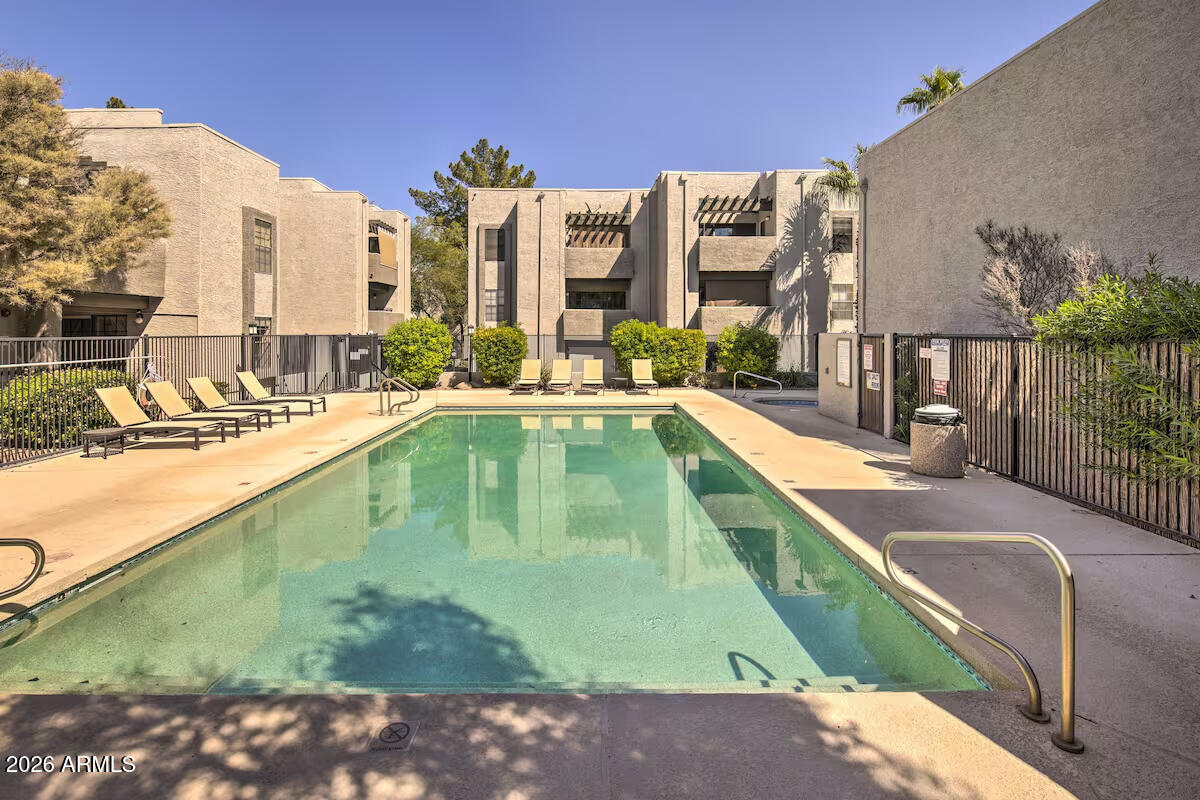 Turnkey and fully furnished, this beautifully maintained condo offers effortless living in a prime Scottsdale location. Move right in and enjoy a thoughtfully designed space featuring a bright, open layout, stylish furnishings, and a private balcony perfect for relaxing. The kitchen flows seamlessly into the living area, ideal for both everyday living and entertaining. Situated in a well-kept community near shopping, dining, spring training and easy freeway access. Perfect as a primary residence, second home or investment opportunity. Property is currently set up as an Airbnb that you can take over with minimal effort, fully furnished and cleaners are already set up!
