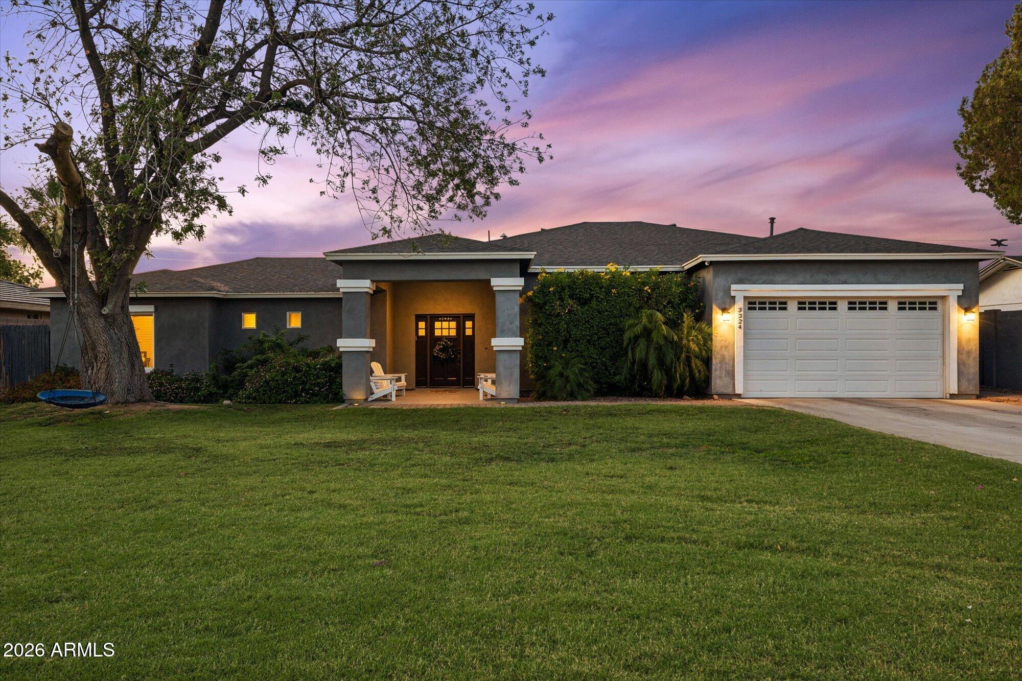 Rarely does a home offer this much space, flexibility, and privacy in one of Phoenix's most desirable locations. Set on an impressive 18,000 sqft lot just moments from Arcadia Lite's acclaimed restaurants, coffee shops, boutiques, and entertainment, this fully remodeled 7 bed, 5 bath residence offers 4,072 sqft designed to adapt to the way you live. Reimagined in 2017, the home blends expansive gathering spaces with thoughtful functionality, highlighted by soaring 12-foot ceilings and dramatic floor-to-ceiling windows that flood the main living area with natural light and create a seamless connection to the outdoors. At the heart of the home, the kitchen was built for both everyday living and hosting on a grand scale, featuring a large quartz island, farmhouse sink, two dishwashers, and a dedicated bar complete with an ice maker. The open layout allows conversation and connection to flow effortlessly between the kitchen, dining, and living spaces, making everything from family dinners to large celebrations feel natural and inviting. Multiple bedroom configurations provide incredible flexibility for growing households, guests, multigenerational living, or dedicated office space.

Situated away from the main living areas, the private primary suite offers a peaceful retreat and a welcome sense of separation from the rest of the home. Outside, the property continues to impress with a backyard designed to be enjoyed year-round. Gather around the gas firepit, enjoy outdoor dining under the Arizona sky, or watch the kids explore the backyard jungle gym. A gated driveway enhances privacy and creates an estate-like arrival experience rarely found in this area.

The detached workshop adds another layer of versatility and could easily serve as a future casita, fitness studio, media room, creative workspace, or golf simulator. Car enthusiasts will appreciate the oversized garage with additional height for a vehicle lift. Combining scale, privacy, flexibility, and an unbeatable location near some of Phoenix's most popular destinations, this is a home that evolves with your lifestyle and offers possibilities that are increasingly hard to find. Experience it in person and discover everything this exceptional property has to offer!