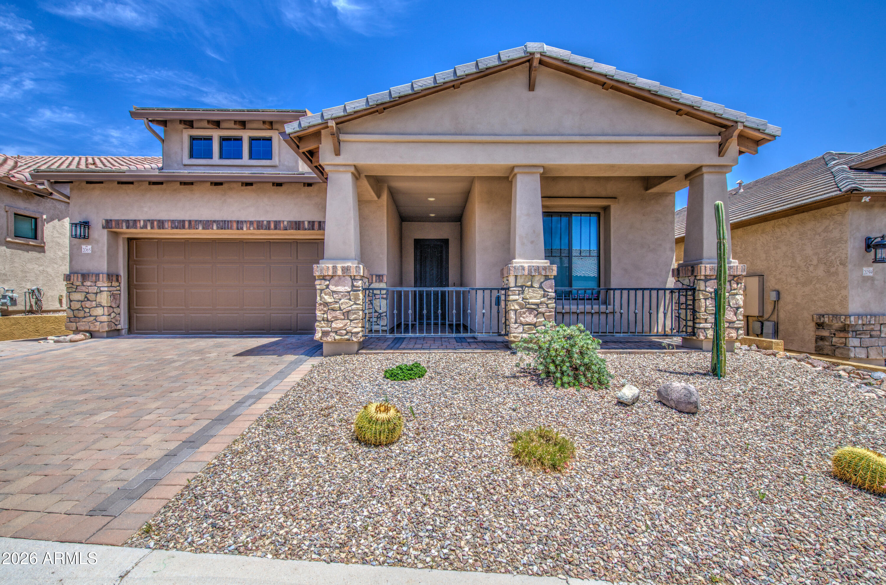 Welcome to the highly sought-after Sanctuary at Mountain Bridge! This beautifully maintained Blandford home offers 2 bedrooms, a versatile den/office, and 2.5 baths with upgraded flooring throughout. The open-concept living area flows seamlessly to the patio through stunning accordion glass doors, creating the perfect indoor-outdoor Arizona lifestyle for relaxing or entertaining. The flexible den is ideal for a home office, hobby room, or guest space. Enjoy resort-style community amenities, including a pool, clubhouse, tennis and pickleball courts, parks, walking paths, and a children's playground. Experience comfort, convenience, and an exceptional lifestyle in one of Mesa's premier master-planned communities.