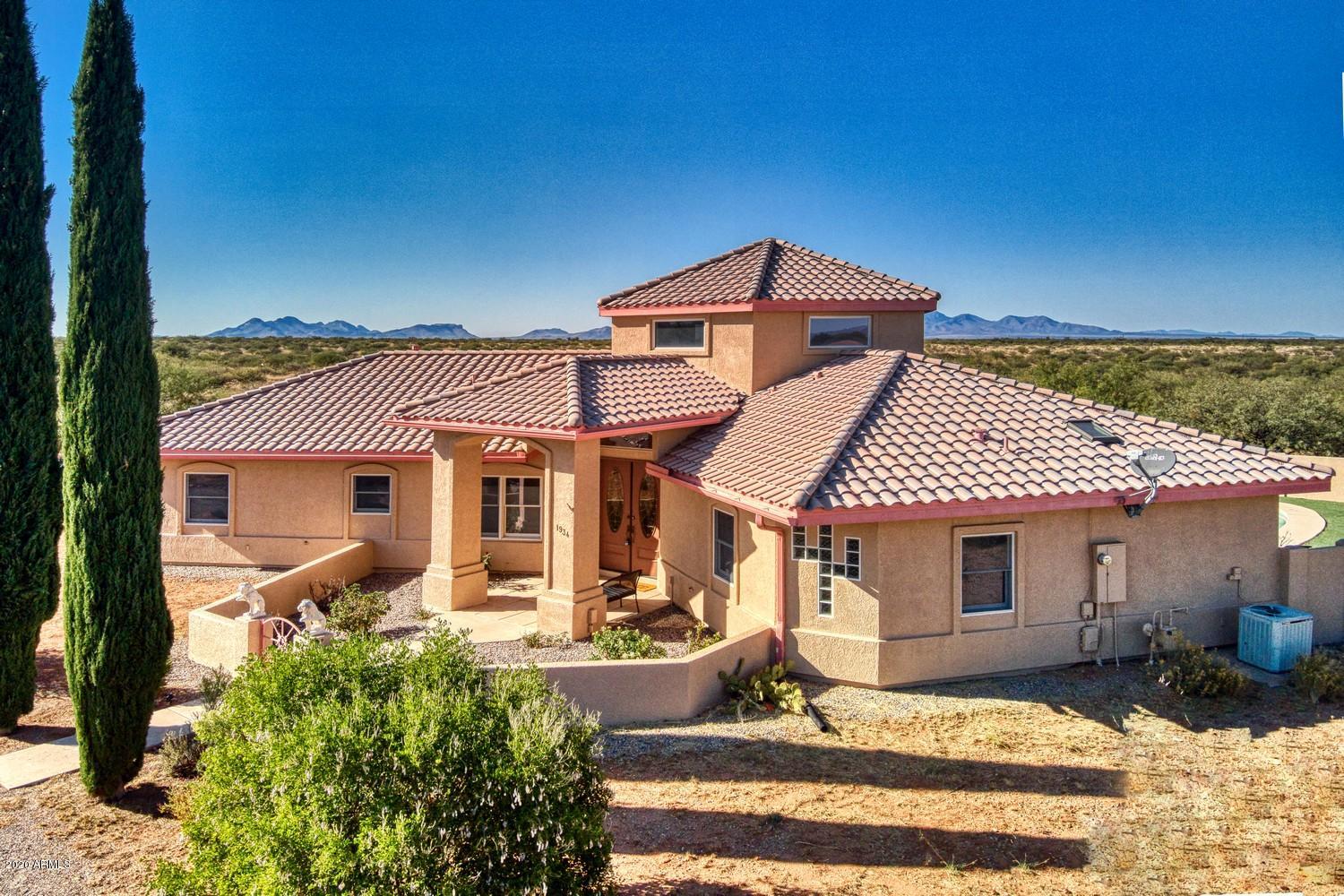Unwind in this lovely single level home located in desirable Ranchos Carmela Estates. This home combines Elegance, Functionality and Livability. 3 bedroom, 3 bath, 3 car garage situated on a 1.68 acre private lot.  Enjoy the peaceful backyard-pool-sunsets-mountain views. equipped with a retractable shade, natural gas bbq, outdoor restroom w shower, raised garden area and a shed.  Bright and airy living room with dimmable light to highlight the high ceiling and electric clerestory windows, it has central vacuum system, two thermostats for optimal temperature/energy-efficiency, luxury vinyl plank floors and a water softener. The kitchen has dual oven, island gas cooktop with downdraft ventilation, chefs pantry and more.  Close to shopping, Ft. Huachuca, freeway, town amenities.  Owner/Agent