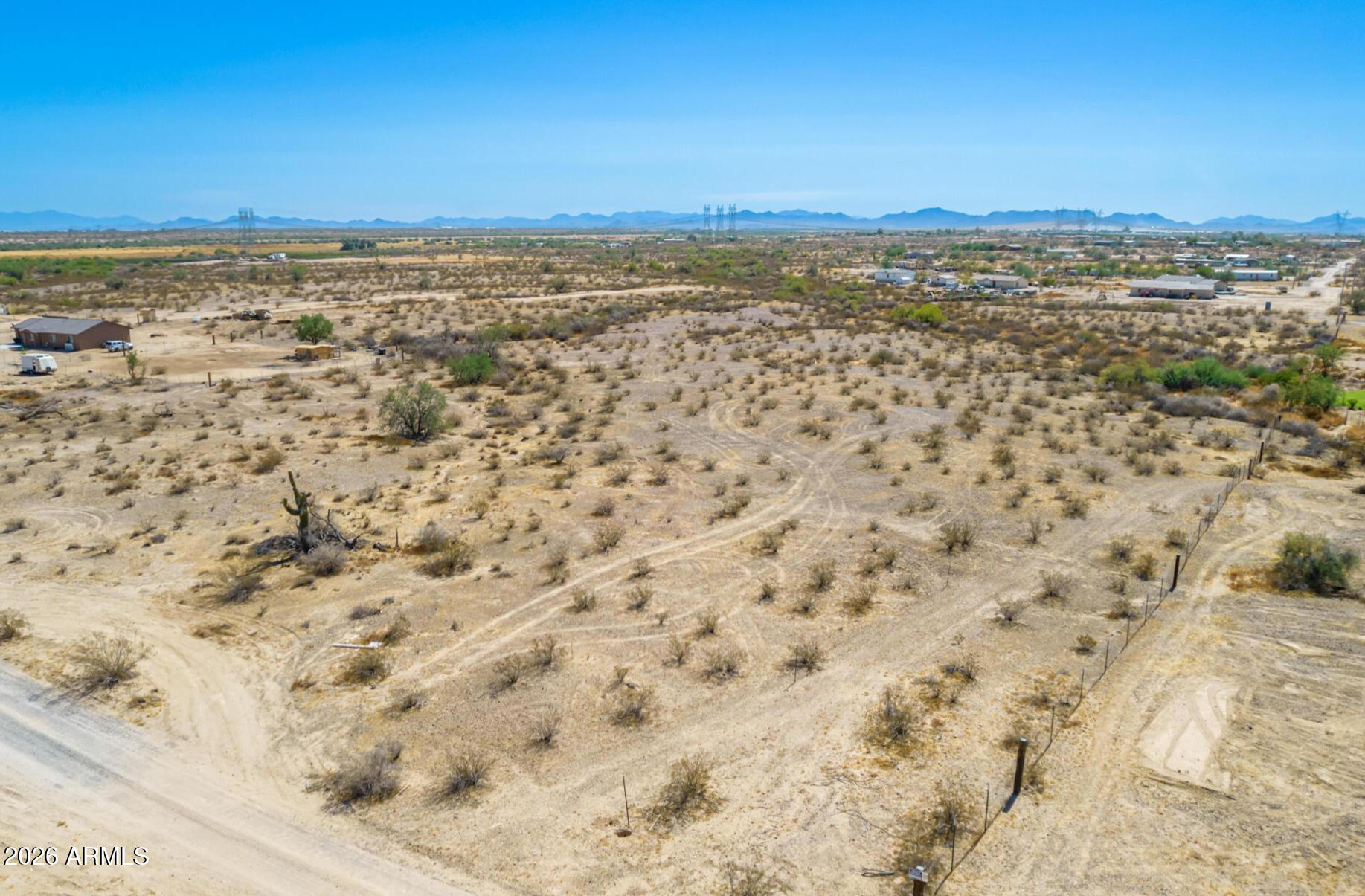 Build your Arizona dream on nearly 7 acres of flat, usable land with breathtaking mountain views and endless possibilities. This expansive parcel offers horse privileges and ample space for a custom home, guest house, RV garage, workshop, arena, or all your outdoor toys or a multi-generational compound. Enjoy the privacy and freedom of country living while remaining within easy reach of shopping, dining, schools, and major transportation routes. Surrounded by beautiful Sonoran Desert scenery and custom homes, this property is the perfect canvas to create the lifestyle you've always envisioned. Build exactly what you want without the restrictions of a typical subdivision. Bring your builder, your horses, and your imagination--opportunities like this are becoming harder to find!