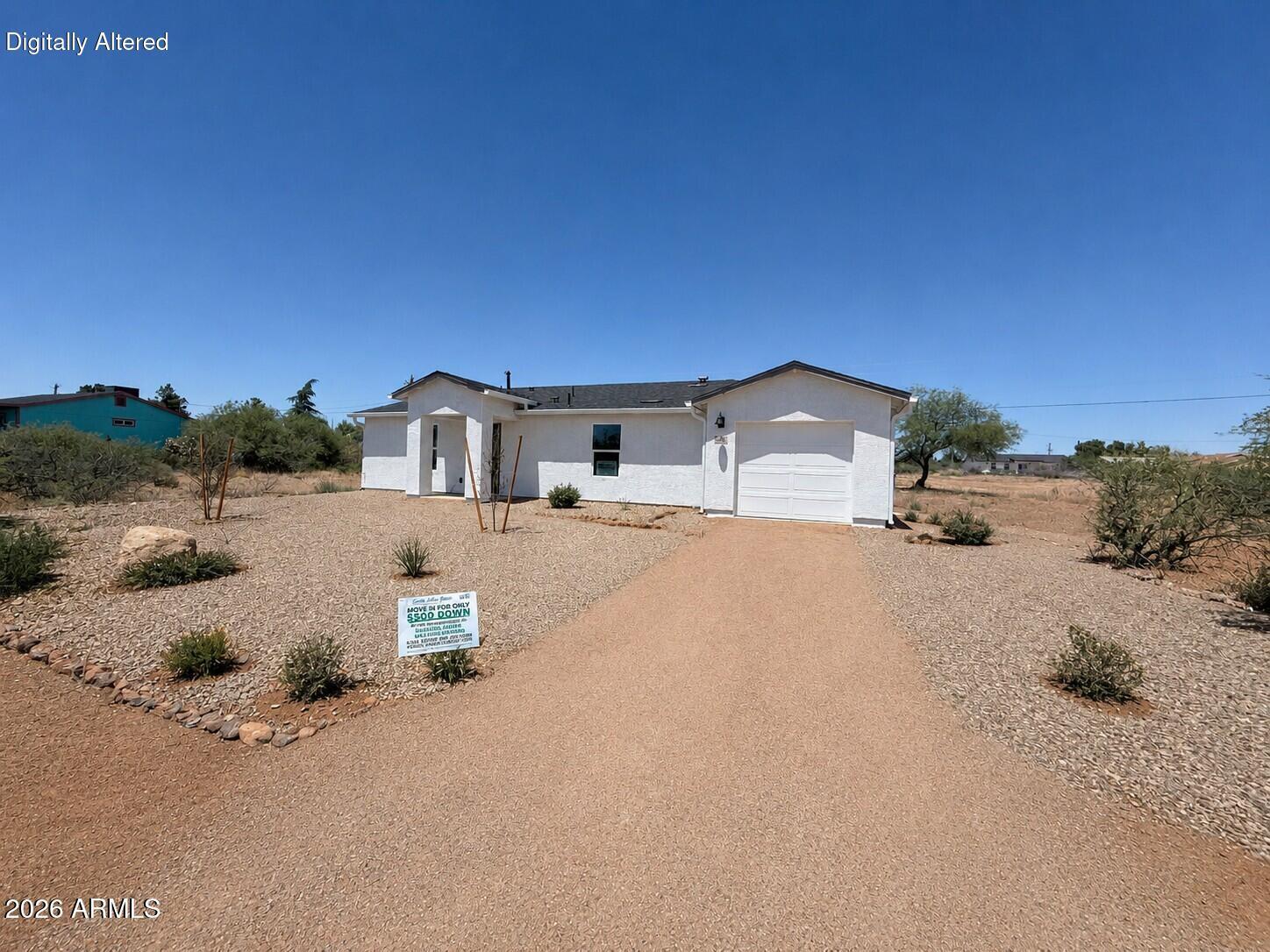 Brand New home on a nice size lot- NO ZERO LOT LINES HERE. Property qualifies for Rural Housing Services which is a no down payment loan for rural properties.   Enjoy the freedom of NO HOA, along with private water service and septic. This thoughtfully designed home features 3 bedrooms, 2 bathrooms, a spacious kitchen and living area, indoor washer/dryer hookups, and a covered back patio perfect for relaxing and taking in the views. Conveniently located with easy access to I-17, making trips to Prescott, Flagstaff, and North Phoenix a breeze. Experience the beauty of Arizona living with room to spread out and make this house your home. Don't wait--affordable homeownership opportunities like this don't last long. VA qualified builder.  Buy before July 1st and seller will include a fence, washer & dryer, blinds throughout home and window screens! Making this property a turn key home with the right offer and terms.