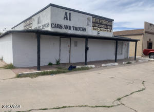 Unique opportunity to obtain the commercial property on central intersection of Casa Grande. This property is located on 12,634 SF lot and consists of two buildings: 2,309 SF Main building and 586 sq ft single family residence. Zoned B-2, has 80 feet of frontage along Pinal Ave and 115 ft on W McMurray Blvd. Building used to be an Attractive and popular neighborhood bar in an excellent, high visibility location. Building was in a fire in 2021, therefore Repairs will need to be made. Property sold as-is! Seller is not responsible for repairs. Buyer to do own inspection and verify all facts. Ready for your own personal touch and creative marketing!