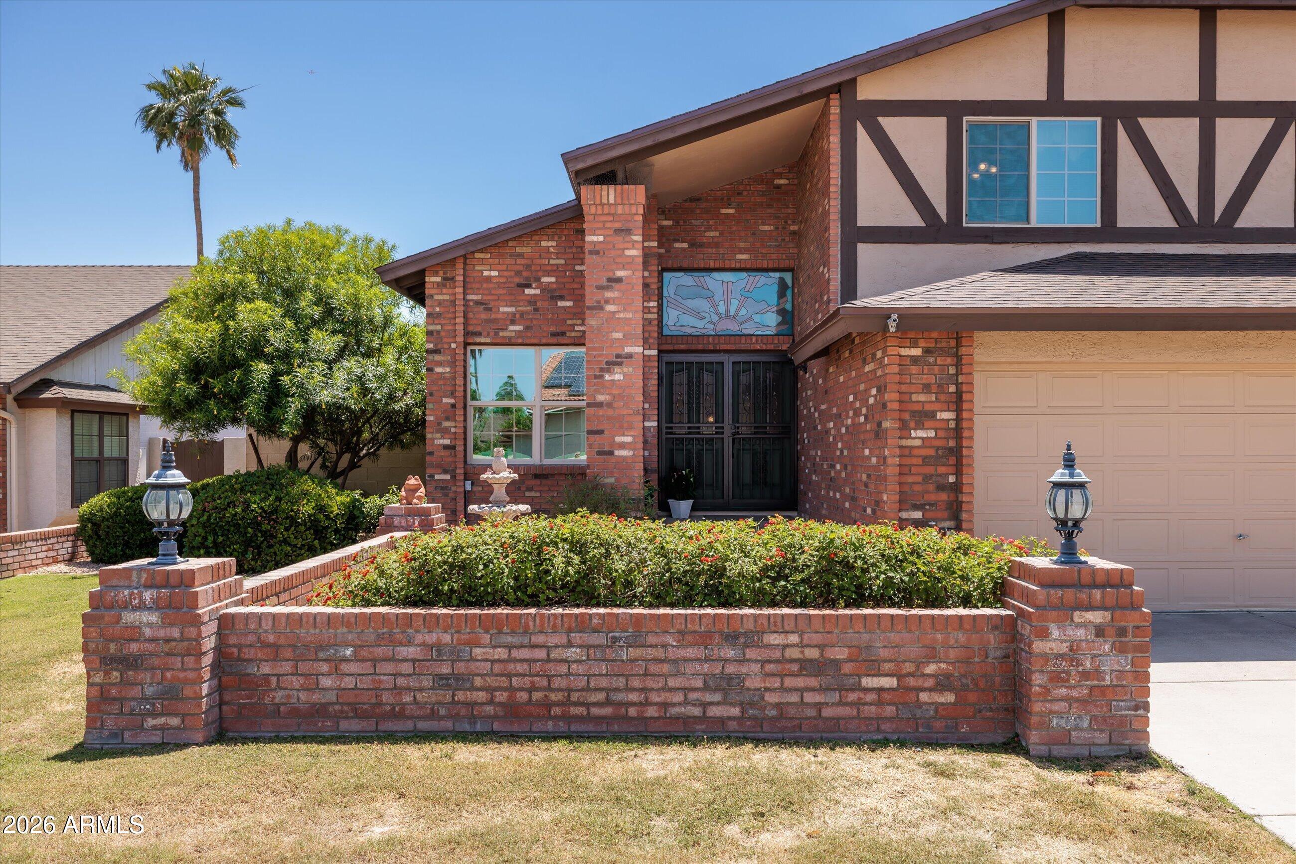 Opportunity Knocks! This 4 bedroom/3 bath/3 car garage home in the desirable ''magic zip code - 85254'' offers space for everyone & everything plus excellent location. This home exudes charm with a brick front exterior & natural grass front yard. Enjoy 2 living areas and a formal dining that can be set up as you desire. There is a bedroom & bath downstairs for guests or as a home office. The upstairs includes a spacious primary with 2 closets and a beautifully remodeled ensuite bath plus 2 secondary bedrooms that share a hall bath. The backyard boasts a sparkling dive pool, extended paver patio, grassy play area & a storage shed. No HOA! New Roof 2025, (2) A/C 2023. New cabinetry in laundry & garage for extra storage. The location is A+, with Scottsdale Quarter and Kierland Commons nearby.