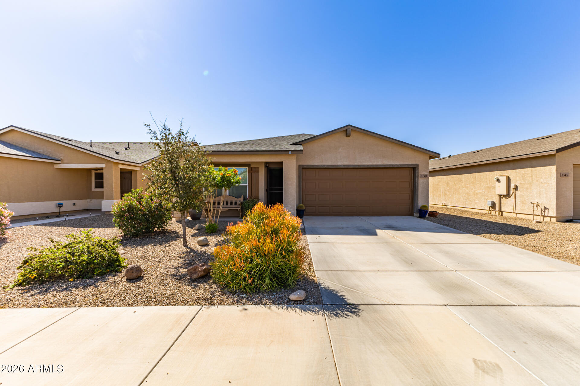 Seller offering $20,000 credit for Solar, Rate Buydown, Closing Costs, or whatever you'd like to use it for!!! Buydown 4.9% for Qualified Buyers, save over $300 a month off your payment vs market rate! Awesome home in Picacho Crossing For Sale! Beautiful desert landscaping and curb appeal greet you as you drive up, with a front patio to enjoy. The inside has a great floorpan, tall ceilings with ceiling fans throughout, and neutral vinyl flooring. You'll love the kitchen with beautiful white cabinetry, stainless steel appliances, pantry, and opens to the family room. The primary bedroom is spacious, able to fit larger furniture, with walk-in closet and primary bathroom. The secondary bedrooms are good size, with shared secondary bathroom. The backyard is already landscaped, with plenty of grass space for kids or pets, and stone and paver patio. If that's not all, enjoy the 2 car garage, inside laundry, and solar to keep utilities low. Welcome home!