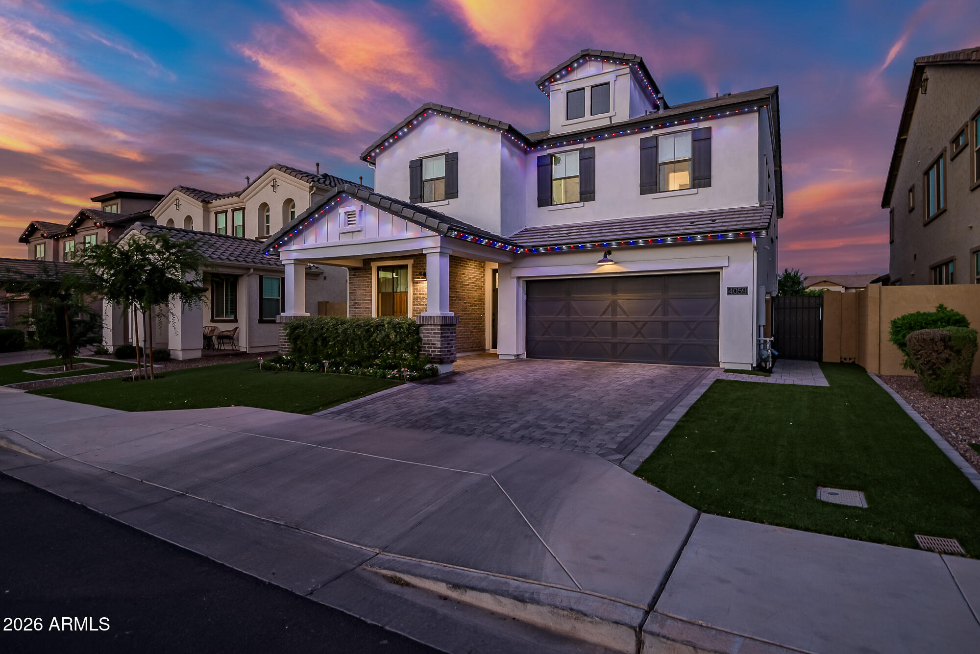 Welcome to this beautifully upgraded 5-bedroom, 5-bath home offering nearly 3,000 SF of thoughtfully designed living space in one of Gilbert's most desirable GATED communities. Featuring 4 en-suite bedrooms, this home offers exceptional flexibility for multigenerational living, guests, or growing families. The luxury kitchen opens to spacious living and dining areas highlighted by custom millwork, designer carpet, and a stunning built-in entertainment center. Professionally designed water-smart landscaping creates beautiful curb appeal with low-maintenance Arizona living. Conveniently located near top-rated schools, shopping, dining, parks, and freeway access, this home combines luxury, comfort, and functionality in a highly sought-after location.