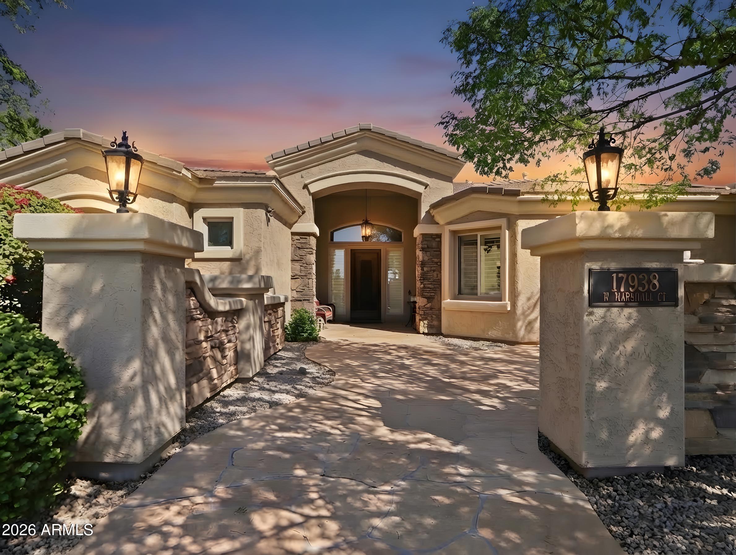 Beautiful custom home in a gated community. A real bargain at $230 per sq. ft. Features covered garage spaces for over 6 vehicles, including a RV GARAGE, perfect for your recreational vehicles or GOLF Simulator. Inside you have Travertine stone floors, granite counter tops, all new kitchen appliances, kitchen island, arched doorways, decorative niches and two fireplaces. Each of the three bedrooms has their own private full bathroom, including the large owner's suite. The owner's suite has His & Her walk-in closets, His & Her separate toilets and a jetted tub. Come take a look today! Great Value for this gated community...