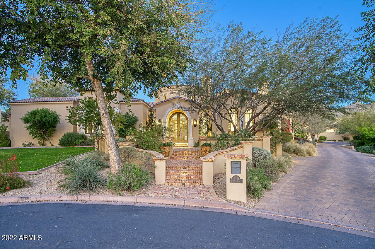 Impressive modern estate with charming drive-up appeal, nestled on a desirable cul-de-sac with lush landscaped grass front yard, in the exclusive guard gated community of Silverleaf Arcadia.  Dynamic home design with optimal functionality, split level great room home plan with owner's retreat, office, theatre, and ensuite guest bedroom down with four additional bedrooms, hidden hobby room and game room with expansive balcony upstairs boasting mountain views.  Architecture rich in character and elegance this well-designed masterpiece focused on deliberate detail maximizing seamless indoor/outdoor living. Resort-style back yard ideal for entertaining with sprawling salt-water pool with two story water slide from balcony, baja shelf, grotto, and spa, chef's outdoor kitchen, covered patio with fireplace, full size sport court, fire pit and seating area and generous grassy area. Exquisite finishes and details are abound, limestone and wide plank wood flooring, grand chandeliers and striking lighting features, intricate woodwork ceilings, chic wall coverings, and smart Crestron home system.  Effortless auto glass pocket doors open great room to outdoor living offering seamless indoor outdoor comfort with stylish zinc wet bar.  Well-appointed kitchen offers an oversized eat in kitchen island, with additional  informal dining area, convenient kitchen prep room, Wolf/Sub Zero appliances, granite countertops, and two dishwashers.  First level owner's wing features private office and expansive suite with large sitting area with fireplace and access to outdoor living.   Lavish spa-like owner's bath with luxurious dual wardrobes, jetted free standing tub, expansive shower with multiple shower heads, and two water closets. Designed with convenience in mind, appreciate four extended garage bays with a built-in command station mudroom, a well-planned utility room with dual washer/dryer design and laundry shoot from second level.
Arcadia at Silverleaf is located at the base of the McDowell Mountain Range in North Scottsdale, Arizona. Full of character this charming 107 home neighborhood is postcard worthy with tree lined streets and three lush parks within an exclusive guard-gate.  Located in the heart of North Scottsdale, with convenience and amenities, this extraordinarily refined estate is picture perfect for the most discerning clients.