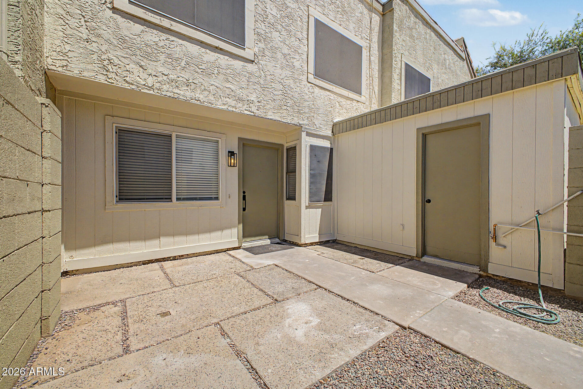 Beautifully updated 2-bedroom, 1.5-bath townhome in a highly desirable community! This move-in-ready home features an open floor plan with spacious living and dining areas, an updated kitchen with modern finishes, and refreshed bathrooms. Natural light fills the home, creating a warm and inviting atmosphere. Enjoy your own private patio, perfect for relaxing or entertaining. Residents have access to two beautiful community pools. Conveniently located just minutes from Westgate Entertainment District, State Farm Stadium, shopping, dining, and entertainment. An excellent opportunity to own a stylish, low-maintenance home in a prime West Valley location!