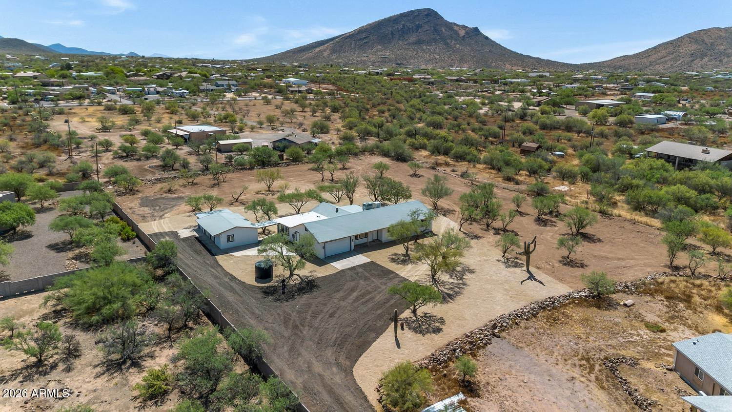 Great chance to own a very unique property up in New River on almost 2 acres of flat useable property that dead ends at easement so allows for privacy and views.  So you have a total of 5 car garage , a 4 bedroom 2 bath house as well as a separate casita that has its own kitchen, bath living area and bedroom with separate entrance from the main house.  Both the kitchen in the main house and guest house are equipped with new fixtures and brand new appliances.  New flooring through out as well new electrical and led lighting.  This home is also situated on its own well so no shared , come see for yourself
buyer to verify all information thank you