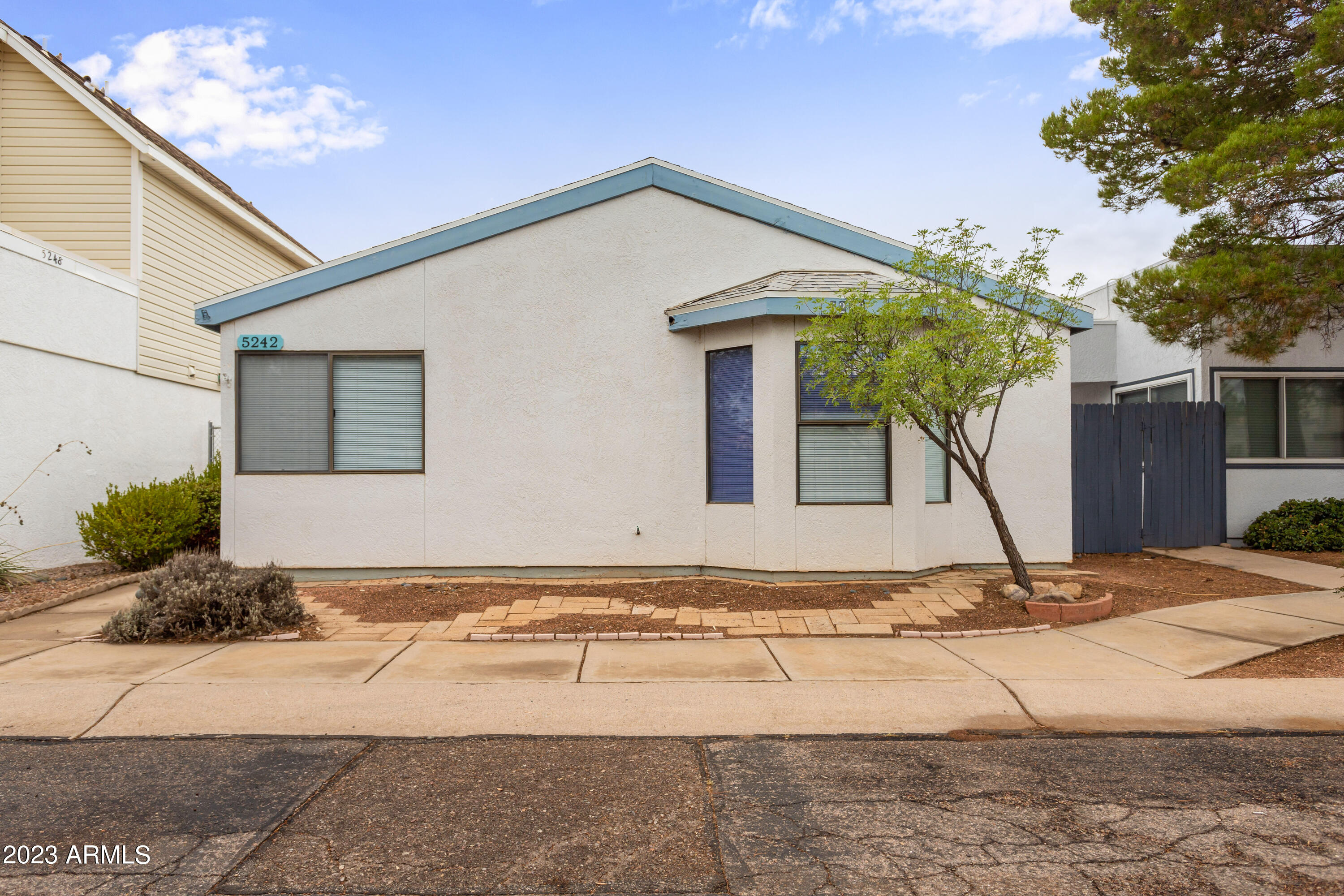 Take a look at this HOME! 3 bedrooms and 2 bathrooms with a bonus room off the master. Bonus area is perfect for sitting room, crafts, gym the options are endless.  Inside has hard floors through out. Fenced backyard with double gate to your private 2 car carport. Great covered patio. Located in Desert Shadows subdivision, so enjoy the community pool without the maintenance. Located on a street with limited traffic but close to all the amenities of town.