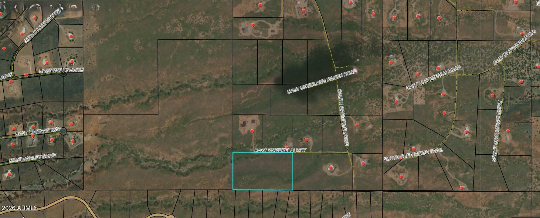 16 acres of breathtaking, 360* panoramic mountain views in a gated community is available to help make your dream home a reality! There are plenty of level areas to build on, with just the right amount of rolls and dips to make the property beautiful and interesting. 
Lovely, well kept homes dot the adjacent properties, but far enough away to preserve your vistas.
Property can be divided into 2 8 acre parcels (all 6 corners are marked), or keep all 16 for your sprawling estate. Currently field/barb fenced on 3 sides.
Owner may carry