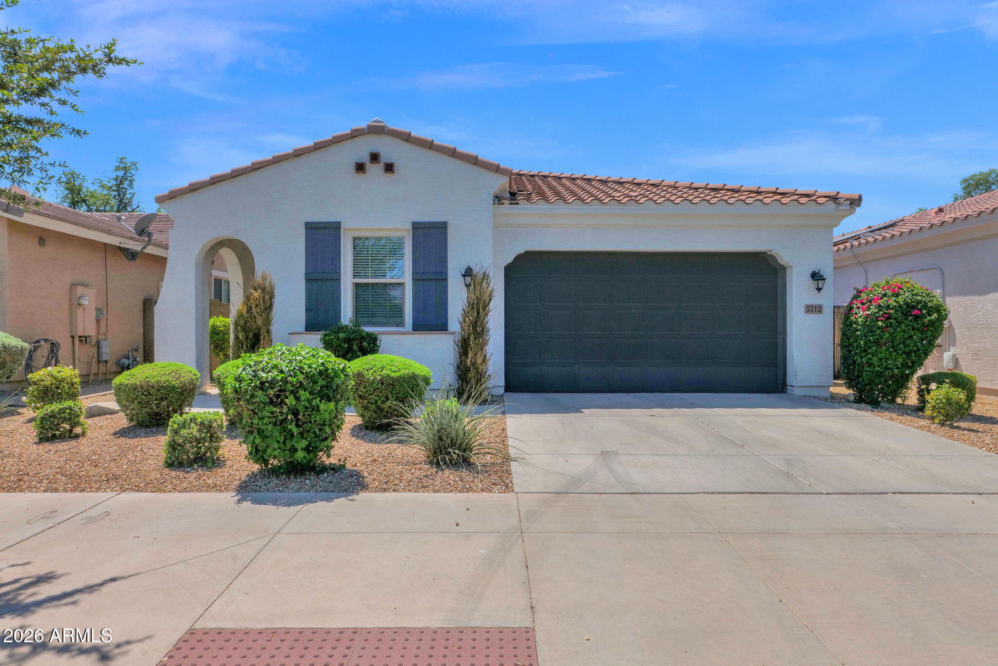 Beautiful 4 bedroom home in gated community. Open floorplan, fully loaded with builder upgrades, beautiful chef's kitchen with custom white cabinetry, granite countertops and backslash, an oversized island with seating space, stainless steal appliances, a pantry and tons of storage. Master split-floorplan. Nice sized bedrooms. Custom wood-plank tile throughout (no carpet anywhere). Double sliding doors lead to a very private backyard, no neighbors behind. Low maintenance landscape. Across the street is community playground and green area no neighbors across the street either. Near South Mountain Park Preserve location delivers a lifestyle of immediate access to world-class hiking and mountain biking, stunning desert scenery while centrally located only 10 mins to downtown Phoenix great dining, golf and major freeways.