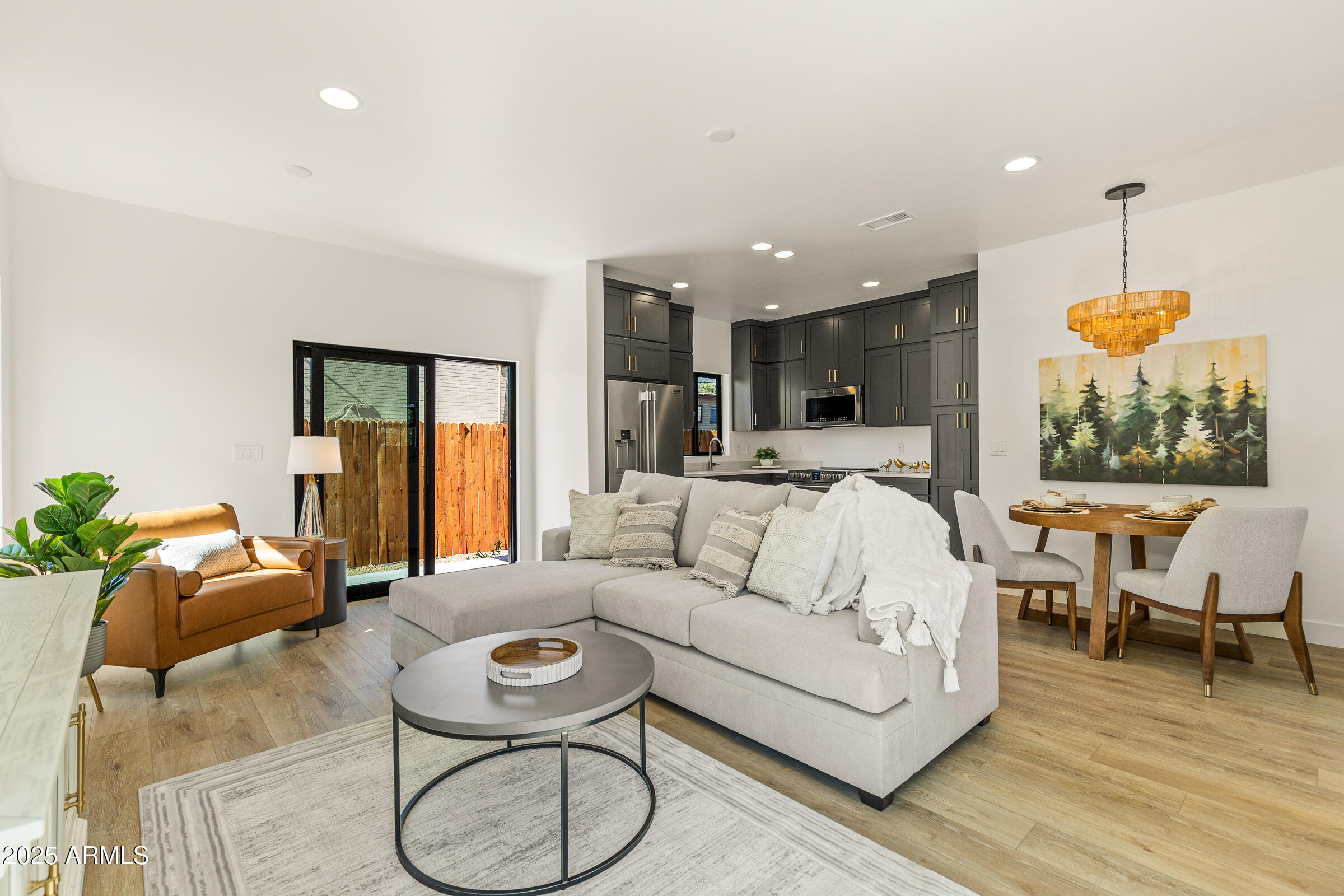 TO BE BUILT, Welcome to modern living in the heart of Flagstaff, a collection of contemporary detached homes that redefine luxury and convenience! The community boasts a sleek and contemporary design that seamlessly integrates with the natural surroundings. Plentiful glass allows ample light natural light to flood the interiors, creating a harmonious blend of indoor and outdoor living. Clean lines, high ceilings, and thoughtfully designed spaces provide an open and airy atmosphere making each home a modern Flagstaff sanctuary. Model home available to view, Lot 11. Buyer to select finishes, photos are examples of a finished unit. Any floorplan can be built on any remaining homesite.