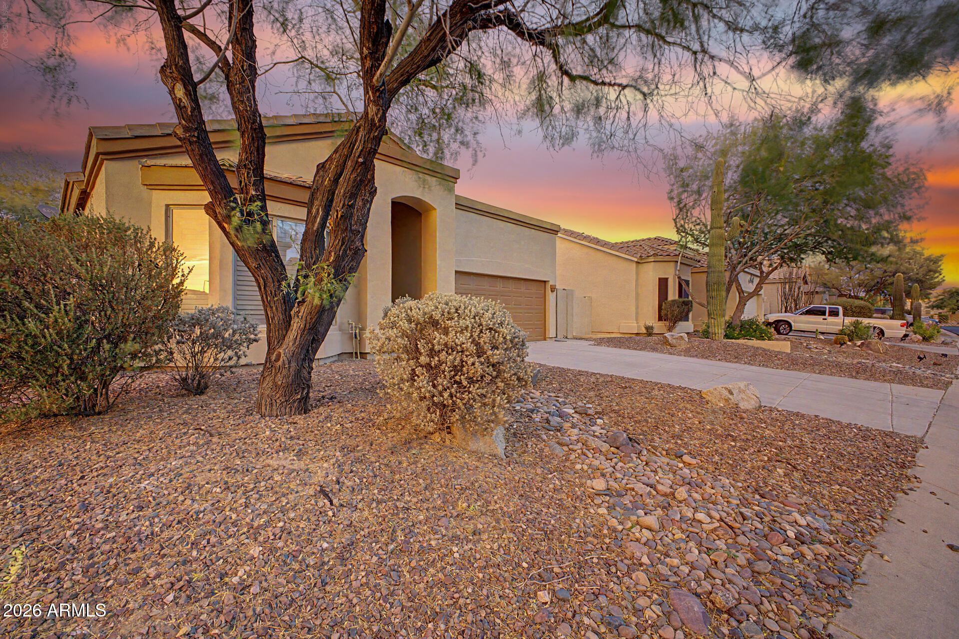 This beautiful single-level home has 3 bedrooms and 2 bathrooms, and sits in the award-winning, gated Las Sendas golf course community. It is close to a pool and spa, tennis and pickleball courts, a playground, and the elementary school. The home features vaulted ceilings, plantation shutters, and a split floor plan. The owner's suite has its own exit to the backyard and a spacious ensuite with a separate soaking tub and shower, double vanities, and a large walk-in closet. The other two bedrooms are roomy and private. The kitchen includes stainless steel appliances, a gas range, Corian countertops, and a family dining area. All appliances are included. Outside, you'll find a large covered patio, mature landscaping, and easy-care turf. The backyard opens to a private wash. This home is in a great spot for dining, travel, shopping, top-rated schools, and many other amenities.