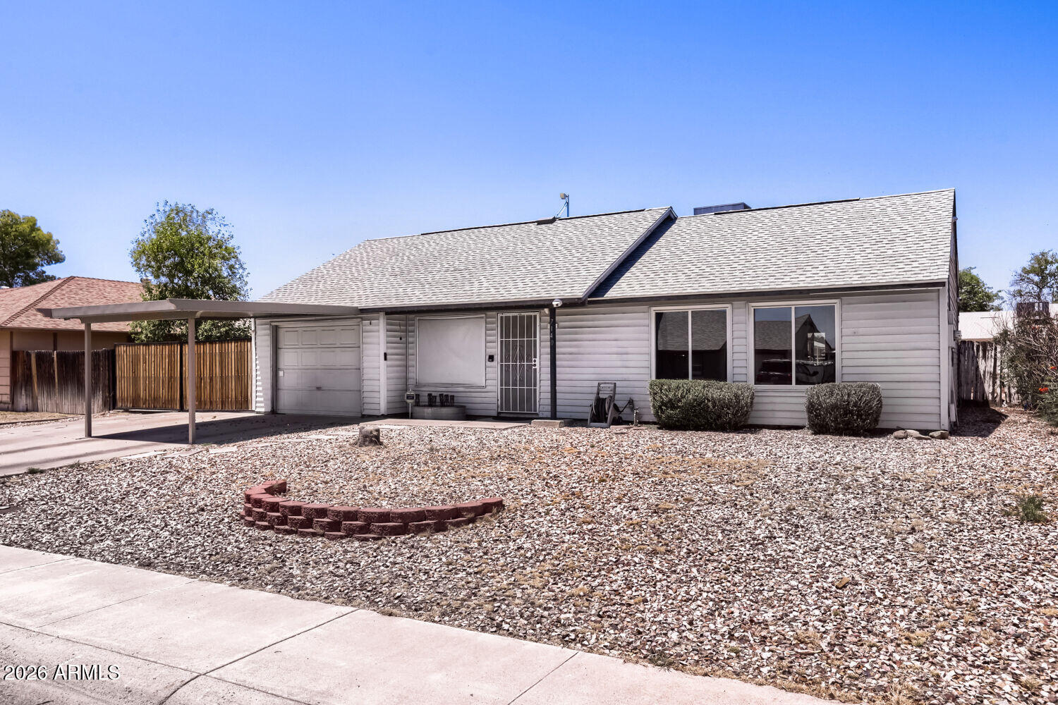 Welcome to this upgraded 4bed/2ba home packed with smart-home features, flexible space, and modern convenience with NO HOA! This move-in ready property features a NEW roof, quality wood laminate flooring, recessed lighting, granite countertops, and a fully integrated whole-home entertainment AND interior and exterior audio/video security system. The open-concept layout is perfect for everyday living and entertaining. Step outside to enjoy the pergola, powered patio sunshades, playset, and dedicated dog run. Additional highlights include permanent programmable exterior lighting on the front of the home, RV parking with double gate access, 20-amp and 50-amp for RV and EV hookups, extended covered parking, a partially insulated workshop/shed, oversized lot, and fresh touch-up paint throughout