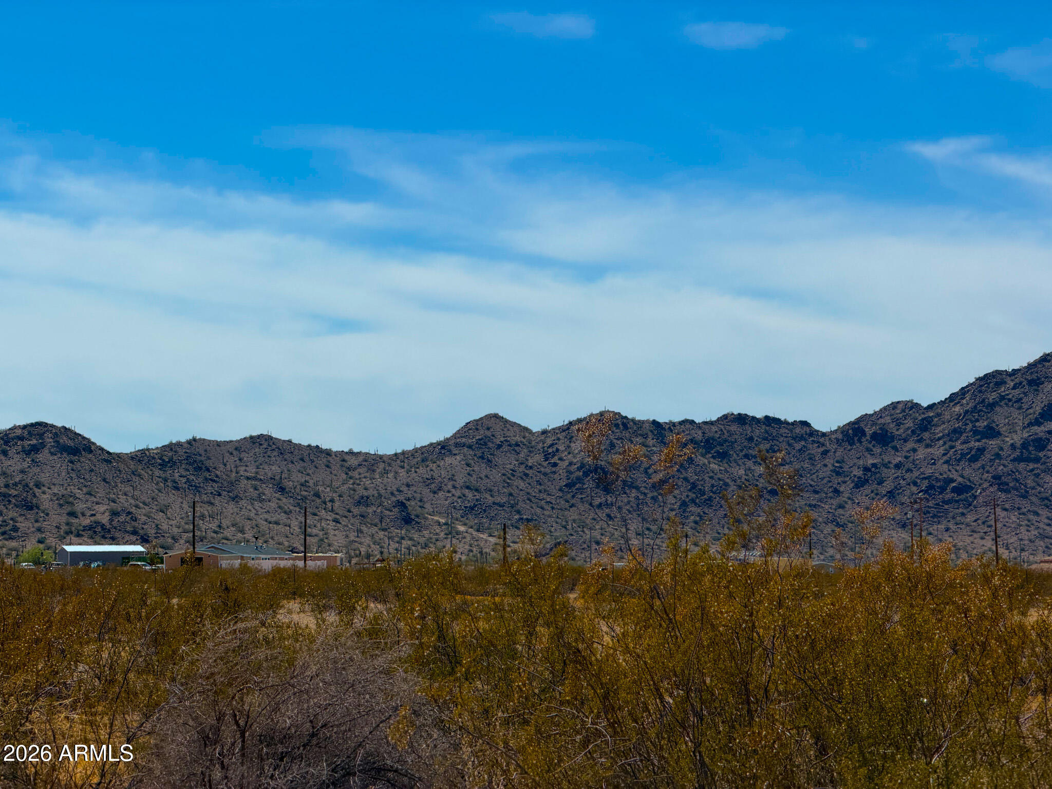1.5 acres in Maricopa. Beautiful views of the nearby Palo Verde mountains along with the Estrella Mountain range to the north. Easy access off of Hidden Valley Rd. . No HOA but property is subject to CC&R's. Only 10-15 minutes from town, giving the feel of peaceful- rural living, while only being a short drive away from tons of amenities & activities. SELLER FINANCING AVAILABLE.
