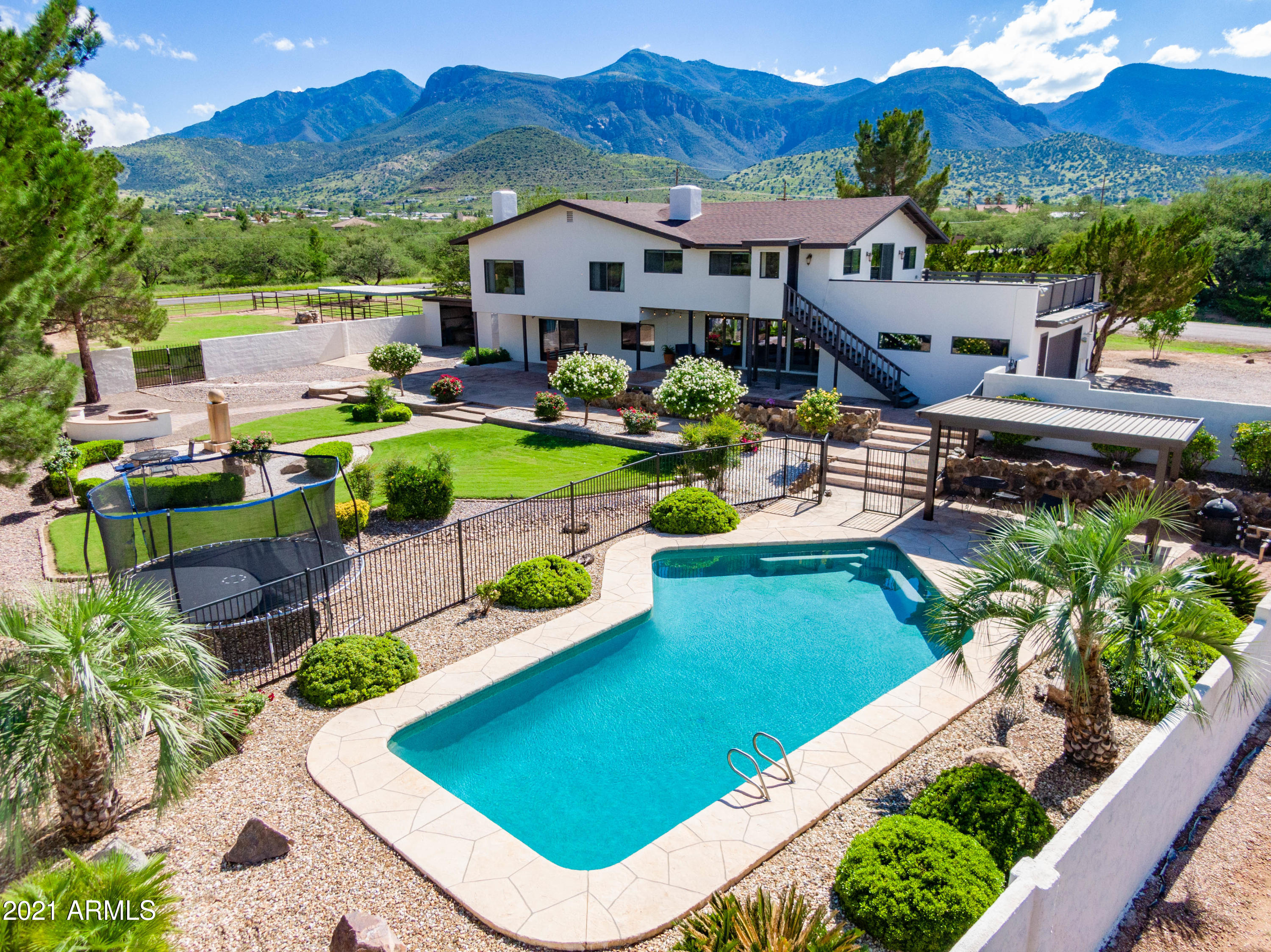 Wow, Wow & Wow!  If you've been looking for a spacious lot, with a expansive home, stunning landscaping and a large pool, horse property, with mountain views, this is your home!  4 bedrooms, 3.5 bathrooms on over an acre with NO HOA.  Inside this home you will find a beautiful mother-in-law suite, kitchen with large island, large owner's suite with upgraded bathroom, ginormous bonus room, large secondary bedrooms and upgraded hall bathroom, plus an office area.  The outside offers even more! A huge second story deck to take in the mountains, heated, oversized private pool with pergola area, fire pit, fountain, patio areas galore, work shed and horse area!!! Schedule your showing now!