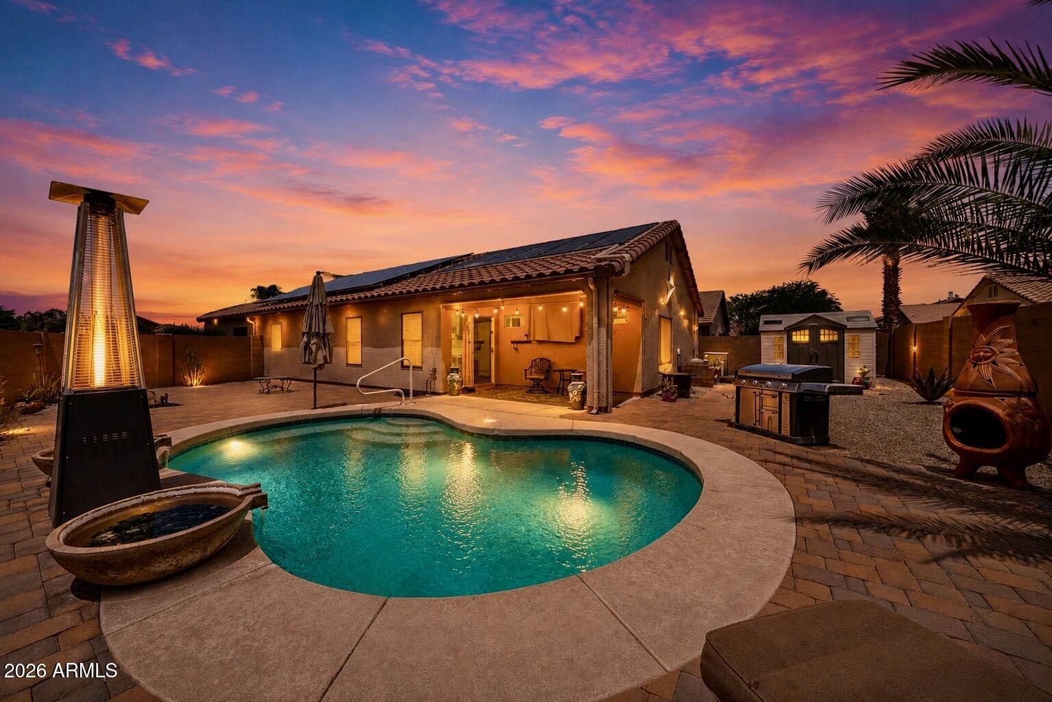 Move-in ready and designed for the Arizona lifestyle! Situated on a desirable corner lot with mountain views, this beautifully maintained home combines comfort, energy efficiency, and outdoor living. Enjoy your own backyard oasis with a sparkling pool, perfect for relaxing or entertaining year-round. Inside, you'll find a versatile bonus room currently used for storage that could easily become a home office, expanded pantry, hobby room, or additional storage space. Owned solar panels, a newer AC, newer tankless water heater, and sun screens on every window help maximize comfort while reducing energy costs. Thoughtfully updated and meticulously cared for, this home is ready for you to move in and enjoy.