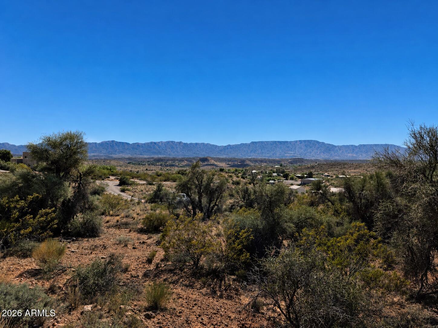 5.5+ acre hillside parcel in the Koch Ranch area of Cornville, bordering US Forest Service land and an active working vineyard for real ambiance. A recorded easement provides legal access to this parcel with multiple build sites which are positioned for tranquil views of Mingus Mountain, House Mountain, and Sedona's red rocks. Power is nearby with an existing transformer on site serving the neighboring parcel; a new transformer will be needed for future service to this parcel (buyer to verify with utility and county). Ideal canvas for your custom home or retreat in Arizona wine country near Page Springs, Cottonwood and Sedona.
