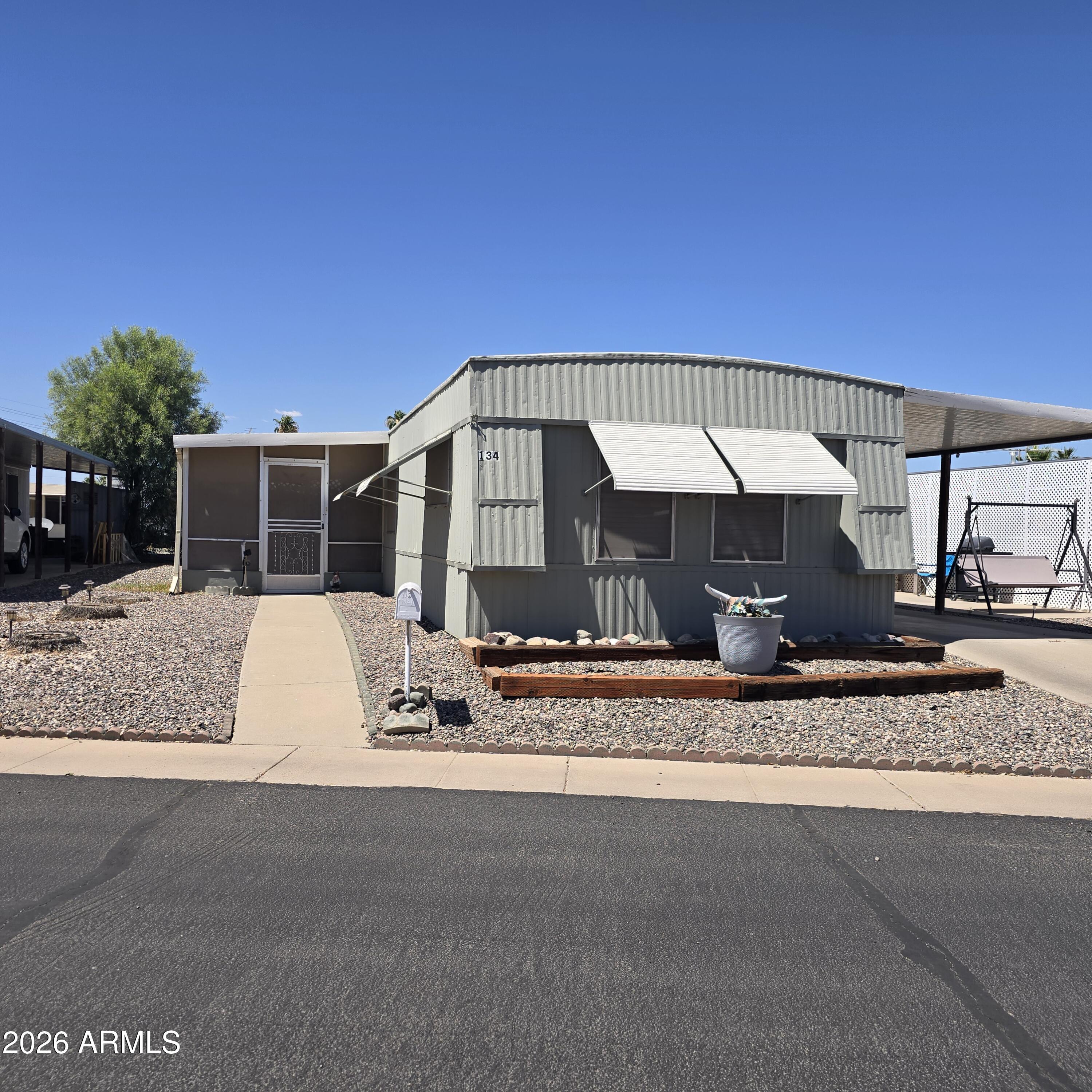 ON LEASED LAND:
This spacious 2 bedroom 2 bath home is just the right size.  Split floor plan with a large open front room and kitchen splitting the 2 bedrooms.  Kitchen has been updated with a kitchen island as well for added counter space.  Lots of can lights for great lighting.  Both bedrooms are good size.  Enjoy the screened in patio and a storage shed.  Ac has been updated. 

Located in Sevilla Sol a 55 plus age restricted community featuring pickleball, dog park, pool, jacuzzi and a newly updated rec center with gym and more.