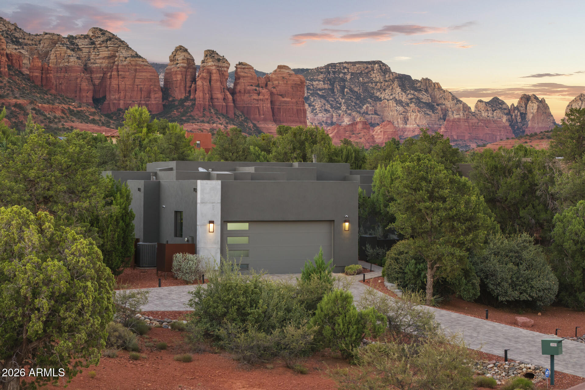 Modern Sedona retreat in the sought-after Thunder Mountain Ranch subdivision. Built in 2018, this single-level 3 bedroom, 3 bathroom home offers 2,465 sq ft on a 7,913 sq ft lot with an attached 737 sq ft garage. Located in West Sedona near hiking trails, red rock scenery, and everyday amenities, this property offers convenient access to some of Sedona's most popular destinations. Approx. 0.4 mi to Amitabha Stupa and Peace Park, 1.5 mi to Thunder Mountain Trailhead, and 0.6 mi to Andante Trailhead. Just minutes to Whole Foods Market, Posse Grounds Park, Uptown Sedona, and Tlaquepaque Arts & Shopping Village. This home has had no expense spared when it was built and maintained. Combined with that quality and the views, this home is one of a kind!
