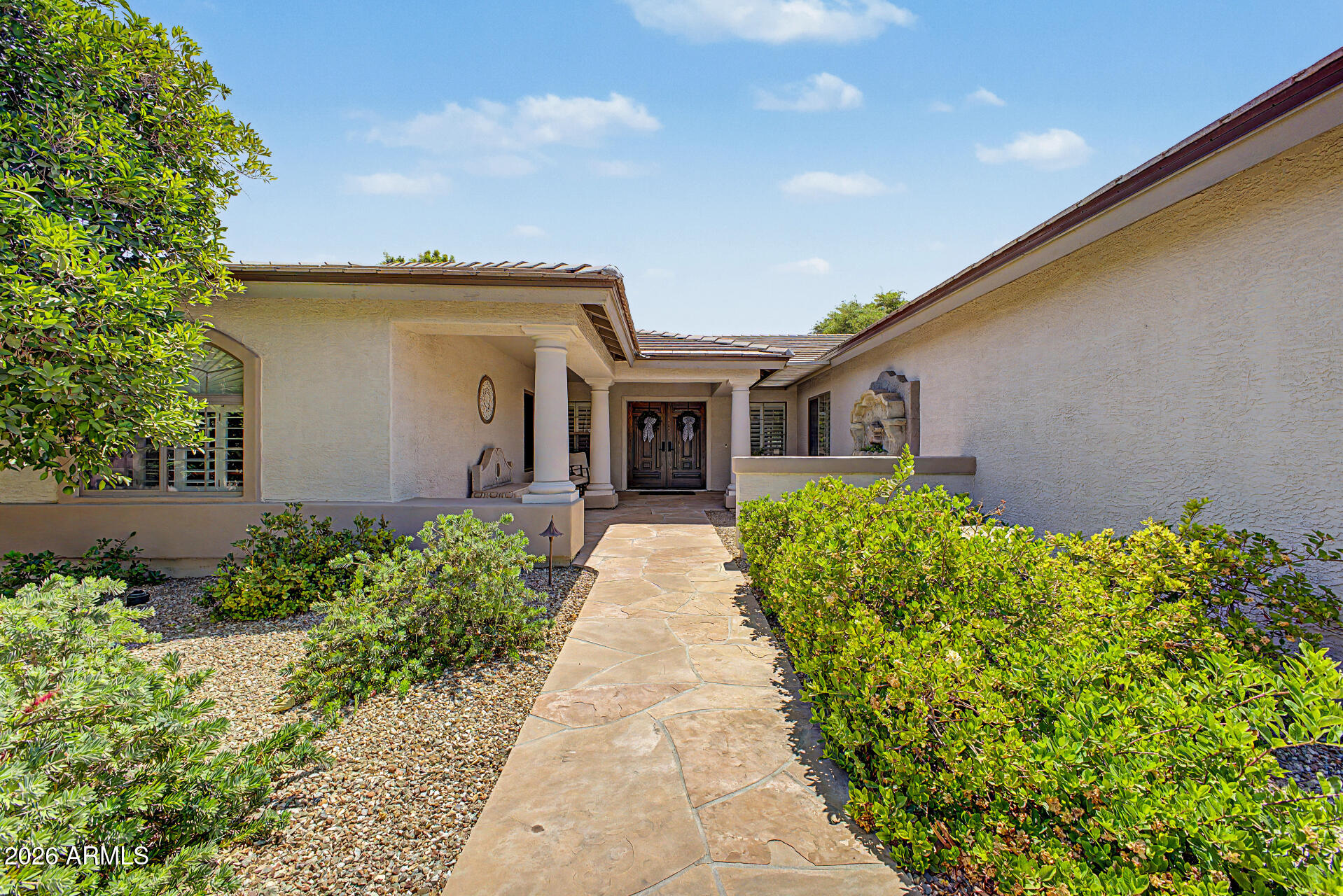 Stunning home in the desirable Mahogany community. 4 Bedrooms, 2 bonus rooms and 3.5 baths. 20,004 sf lot that includes 13 citrus trees, 7 Washington Navals, 3 Valencia, 1 Lisbon lemon, 1 Pink Grapefruit and 1 Key Lime. Resort-style backyard that includes a sparkling pool and spa, built-in BBQ with large pergola and misting system. As you enter the home you'll notice the new hardwood flooring throughout the living areas, custom fireplace mantel and all new door hardware with easy exterior door rekeying feature. New light fixtures, new carpet in bedrooms. New kitchen faucet, updated laundry room and powder bathroom. New pool filter. Built-in murphy bed in guest suite. Many smart home features. Built-in home theater with projector screen, and surround sound. Ready to move right in.