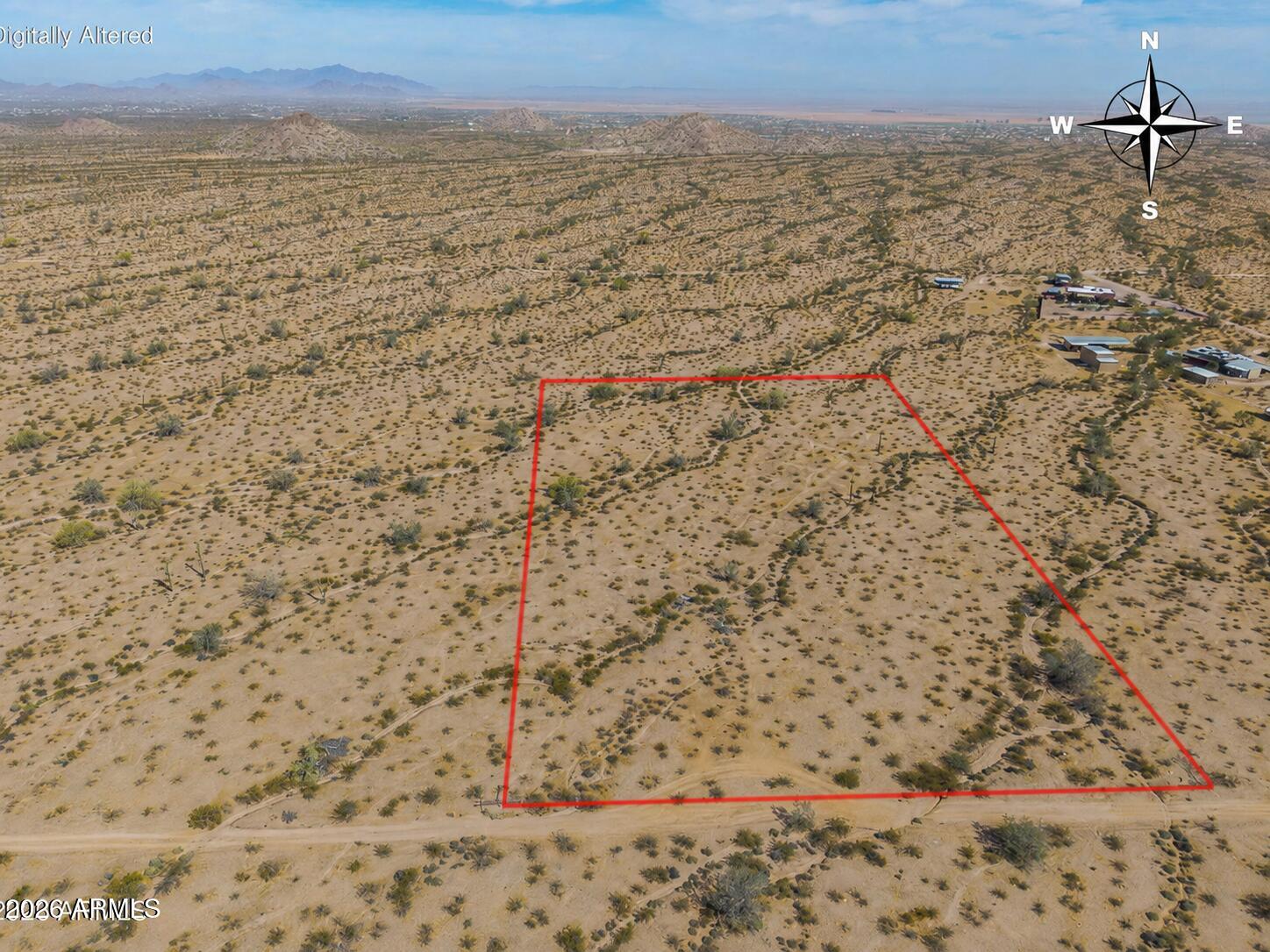 Discover the wide-open beauty of rural Arizona with this 5-acre parcel in Casa Grande offering stunning desert and mountain views in every direction. Surrounded by natural Sonoran landscape, mature saguaros, and peaceful desert terrain, this property provides the perfect setting for your custom home, manufactured home, or long-term investment. Enjoy the privacy and tranquility of rural zoning while still being within a reasonable distance to Casa Grande amenities, I-10 access, and continued area growth. The property features mostly level ground with natural desert washes, making it ideal for a variety of uses while maintaining the character of the land. Whether you're looking to build now or hold for the future, this property offers flexibility, views, and value