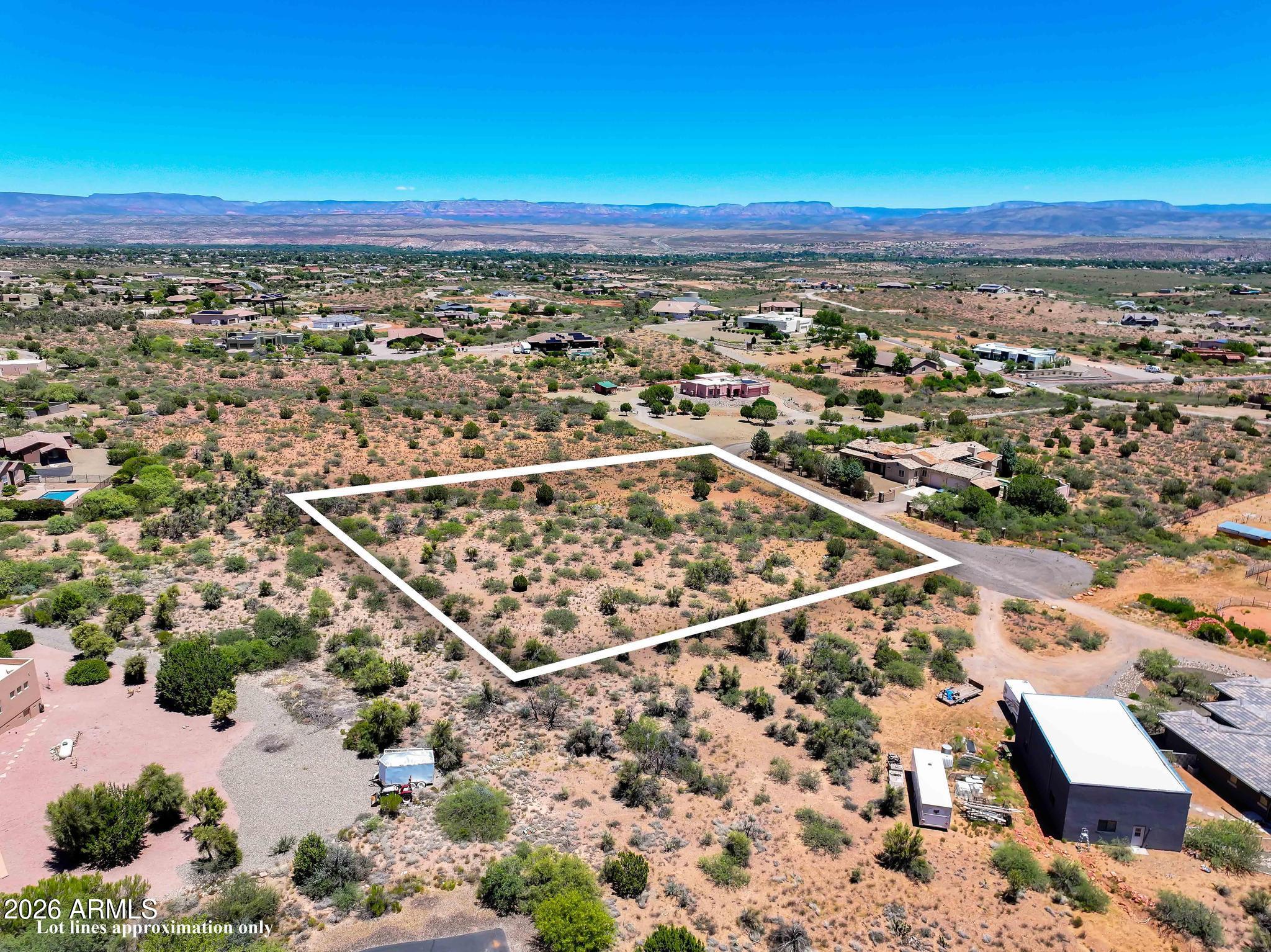 Build your dream home on this spectacular level 2-acre homesite located on a private road. Enjoy breathtaking panoramic views of Mingus Mountain, Sedona's iconic Red Rocks, and unforgettable Arizona desert sunsets. This premium parcel features natural desert landscaping, paved road access, and a peaceful setting that offers both privacy and convenience. Just minutes from Sedona, Jerome, and Old Town Cottonwood, you'll have easy access to world-class hiking, horseback riding, mountain biking, kayaking, dining, and local wineries. A rare opportunity to create a custom home surrounded by some of Arizona's most stunning scenery.