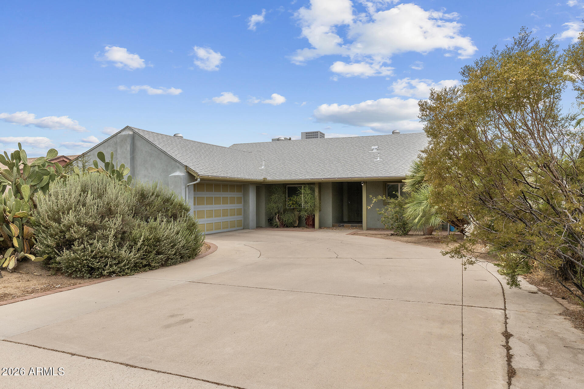 No HOA, owned solar, and endless possibilities--this energy-efficient home is ready for your vision! This 3-bedroom, 2-bath home sits on a spacious lot with plenty of room to add a pool, expand the garden. Design the backyard of your dreams. Enjoy exceptional energy savings with owned solar panels (no lease payment to assume--the solar ownership transfers to the buyer at closing). The home also includes a swim spa that conveys and a garage equipped with two solar EV charging ports for added convenience. Ideally located just minutes from SR 51 and Loop 101, you'll enjoy easy access to shopping, dining, and commuting while still having the freedom of no HOA. A rare opportunity to own a move-in-ready home with space, efficiency, and flexibility!