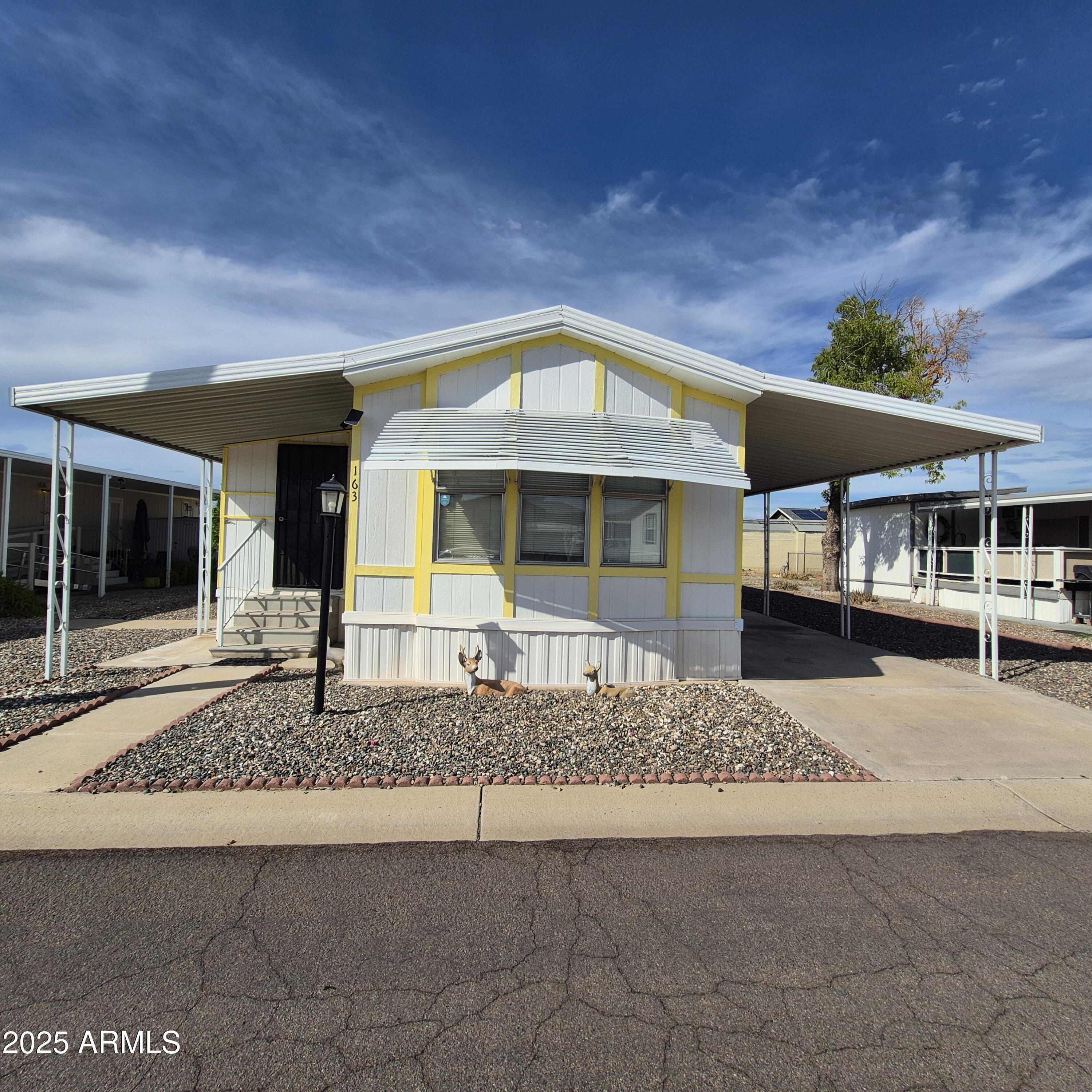 Spacious 14' x 68' home offering over 950 sq. ft. of comfortable living space. This 2-bedroom, 1-bath beauty features a bright kitchen with attractive cabinets and plenty of storage. Move-in ready and turnkey, this home is perfect for easy living. Located in the inviting Suncrest One Mobile Home Park,