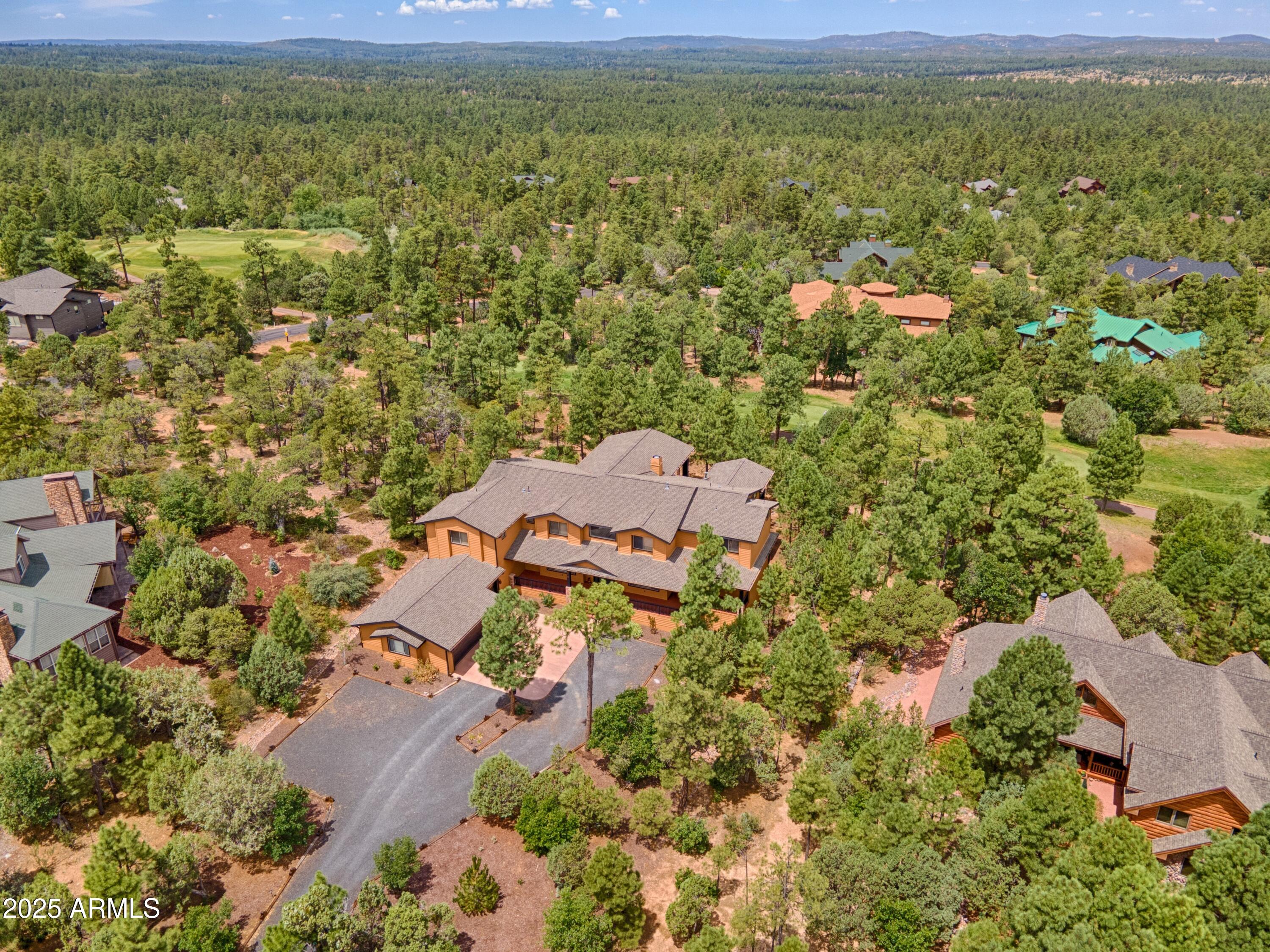 This beautifully built home sits on the #17 of the cabin course, it offers 6 bedrooms (4 suites w/ baths and 1 with no closet), 7 bathrooms (2 are 1/2 baths), separate office with built ins, upstairs media room w/ kitchen setup and its own balcony, extra-large great room, separate dining room, extra-large kitchen with all the upgraded appliances. Kitchen island that will fit 8+ people, screened in sunroom, two staircases to the upper level, owner's bedroom down w/ own see through fireplace and separate sitting room, walk in closet, Jacuzzi tub. Granite throughout, wood floors, grand stone-faced fireplace in living room, three car garage, extra-large laundry room with storage cabinets and sink, tankless water heater, alarm system. Driveway has extra parking for your guests.
