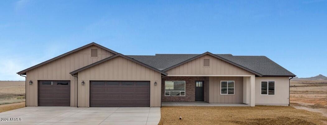 Brand new all-electric home on 4 acres behind the gates of Copperfield! Thoughtful upgrades include an oversized front covered patio, open kitchen with large island, custom cabinetry, Frigidaire Gallery stainless appliances, induction oven with pizza feature, and a custom pantry with outlets for small appliances or a coffee bar. The primary suite offers direct access to the laundry through the walk-in closet. A second ensuite, third bedroom, office/4th bedroom, and guest bath provide a flexible split floor plan. Enjoy Bradshaw Mountain views from the covered back patio, wired for a future hot tub. Oversized 3-car garage with tandem workshop bay. Private well with filtration system and softener plumbing. Move-in ready with newly completed paver driveway!