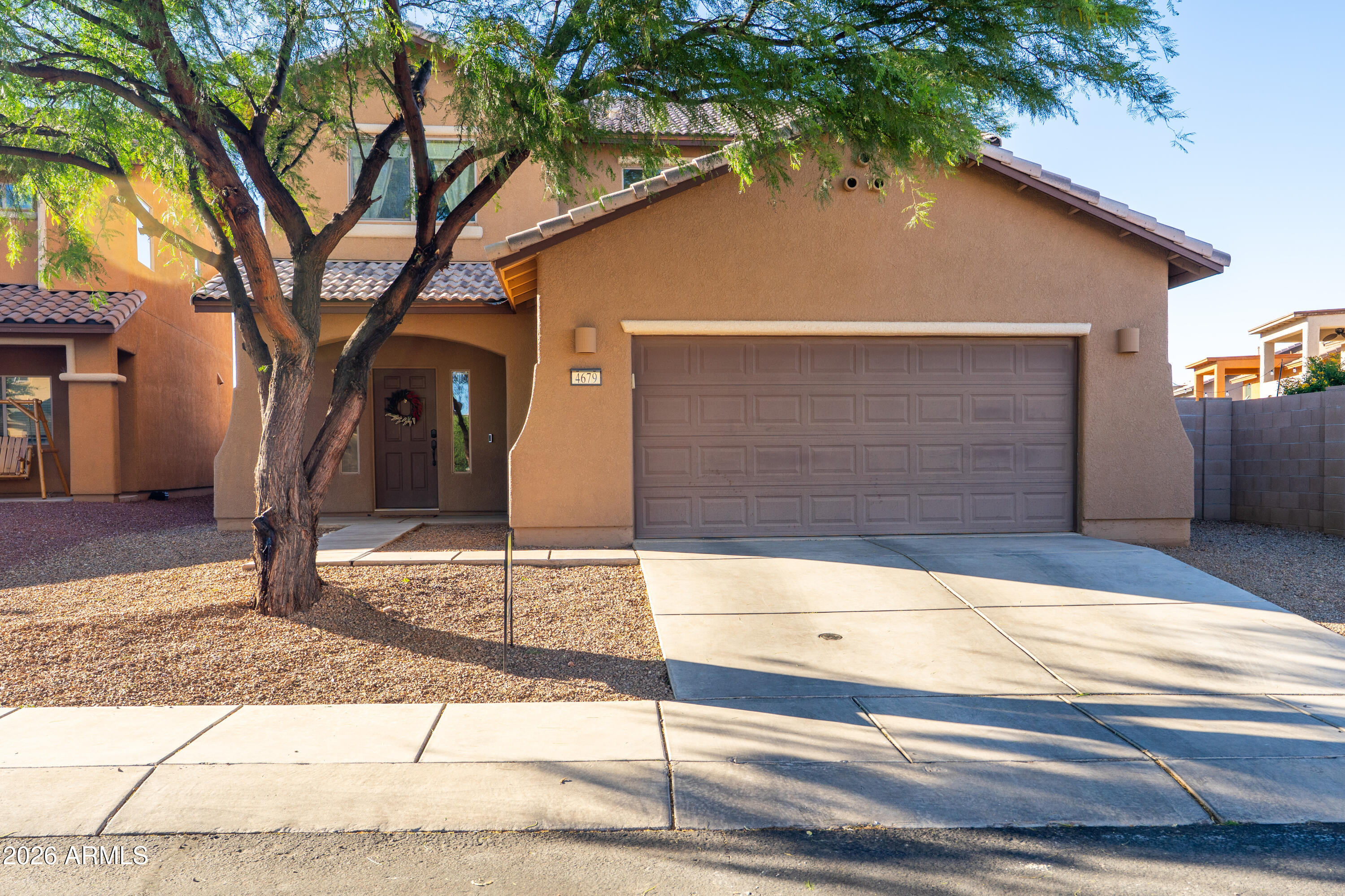 Beautifully maintained 4-bedroom,3-bath home with a bonus bedroom/office/playroom in the Holiday Retreat subdivision. Offering 2,293 square feet of thoughtfully designed living space, this home seamlessly blends comfort, functionality, and style. The awesome layout features spacious living areas, abundant storage, and generous closet space throughout. Step outside to enjoy breathtaking sunsets from the covered patio overlooking the beautifully landscaped backyard with low-maintenance turf. With ample room to live, work, and entertain, this home truly has it all. Residents of Holiday Retreat enjoy access to two community pools, a hot tub, clubhouse, fitness center, and childrens playground. Do not miss this exceptional opportunity to view this home.